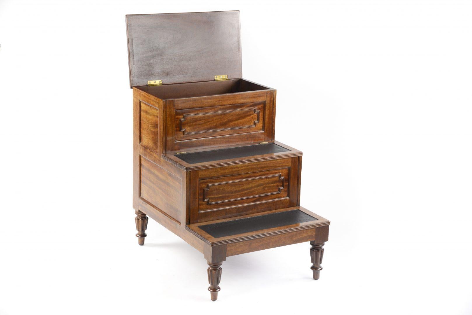 A good original set of bed steps containing a commode in mahogany with reeded legs attributed to Gillows of Lancaster, George IV, circa 1825.


Gillows of Lancaster and London, also known as Gillow & Co., was an English furniture making firm