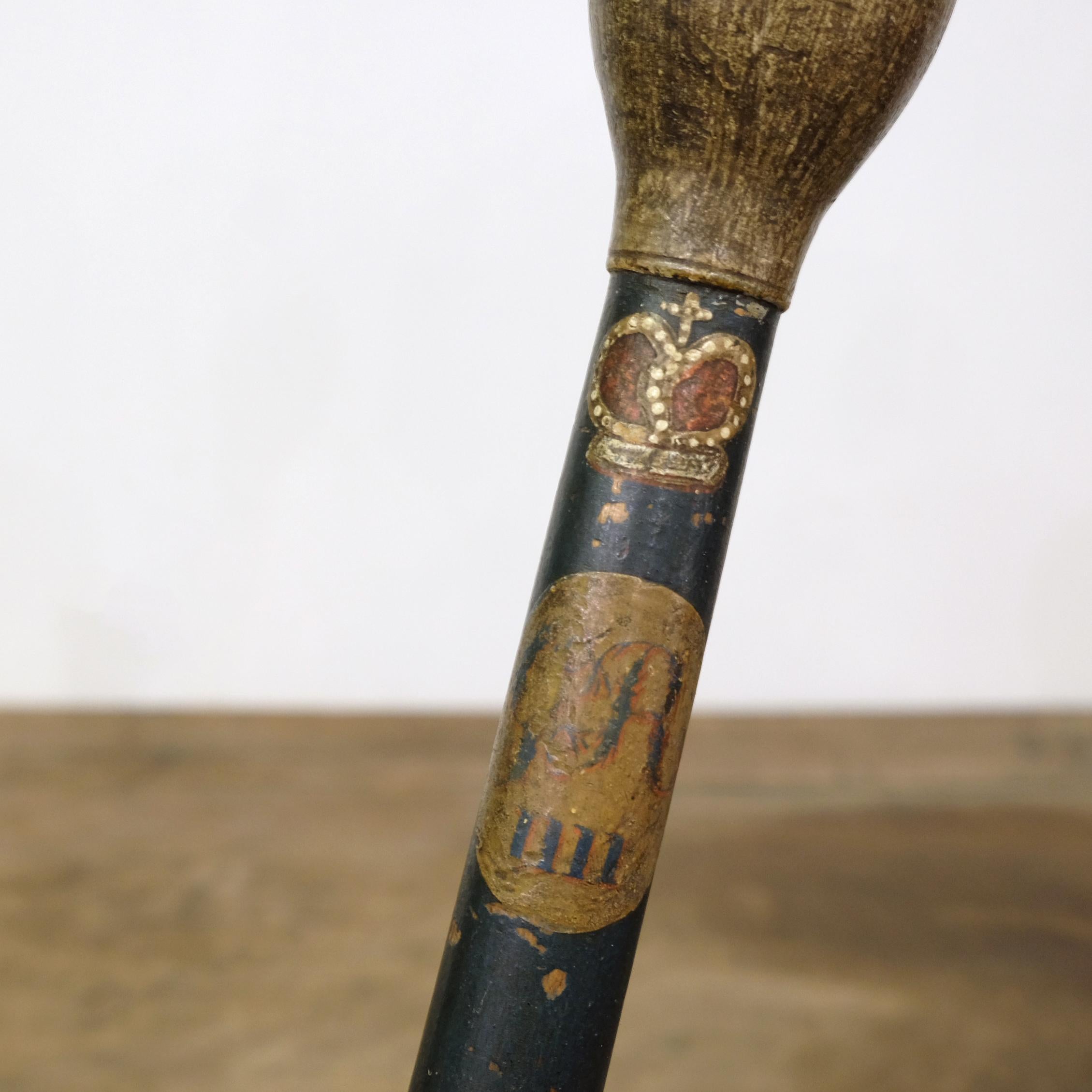 A George IV painted police cosh or truncheon in very good order with only very minor paint loss. Well preserved hand-painted royal cipher with detailed crown above. On bespoke made ebonised oak stand. George IV’s reign lasted only ten years from