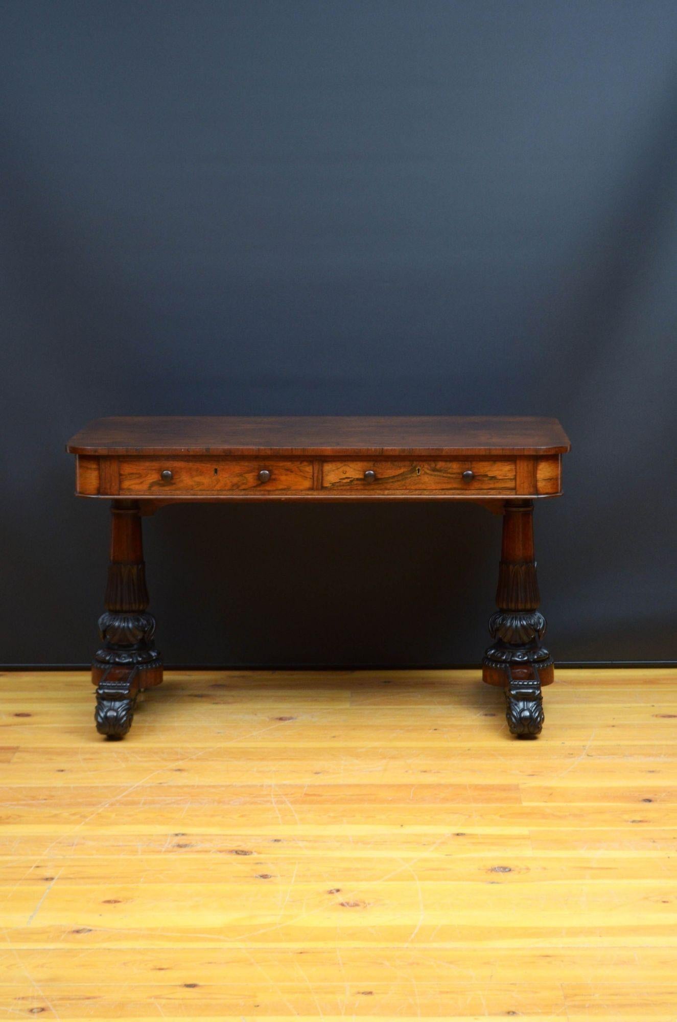 Sn5528 Outstanding George IV rosewood library table in the manner of Gillows, having stunning well figured rosewood top above two mahogany lined frieze drawers fitted with original turned knobs, all standing on two tulip carved columns with acanthus