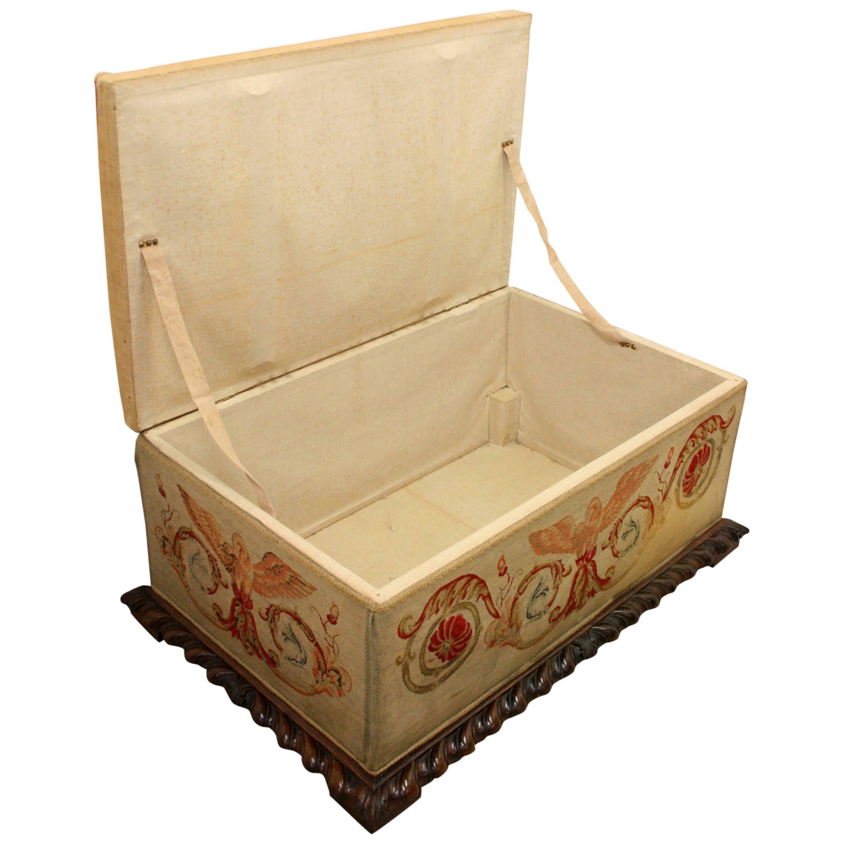 Late George IV rosewood ottoman, circa 1830. The rectangular top and sides with Aubusson-style tapestry panels, above a gadrooned edge and square section feet with counter-sunk wooden castors.