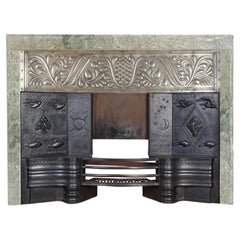 George Jack. Arts & Crafts cast iron plated copper & Cipollino marble fireplace