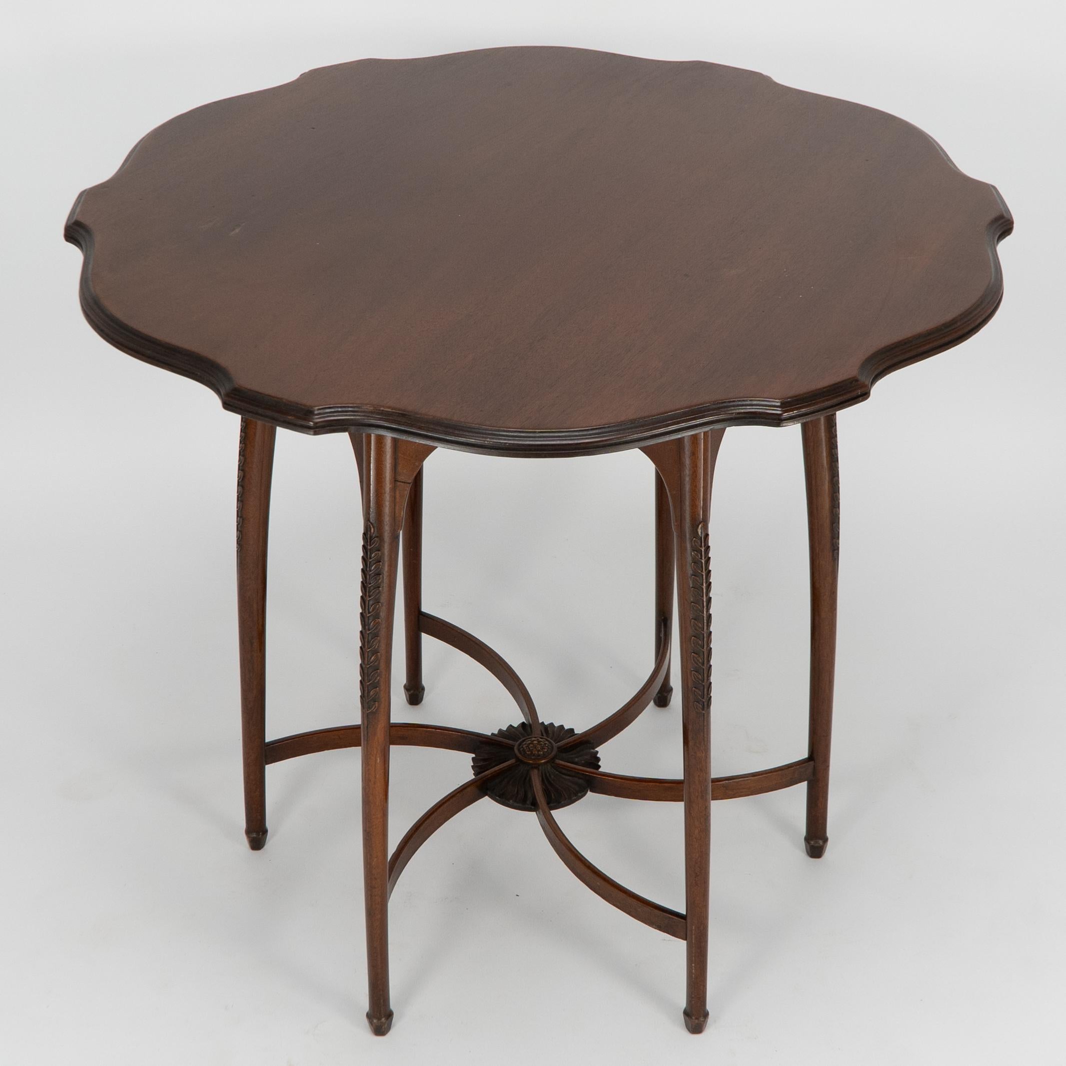 Late 19th Century George Jack for Morris and Co. A high Aesthetic Movement circular side table For Sale