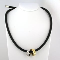 GEORGE JENSEN 18k gold pendant on a rubber necklace with silver clasp 23.5 gram