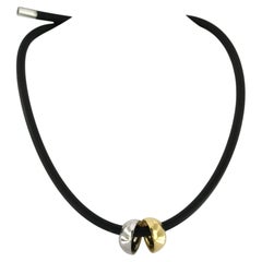 GEORGE JENSEN 18k gold pendant on a rubber necklace with silver clasp 23.5 gram