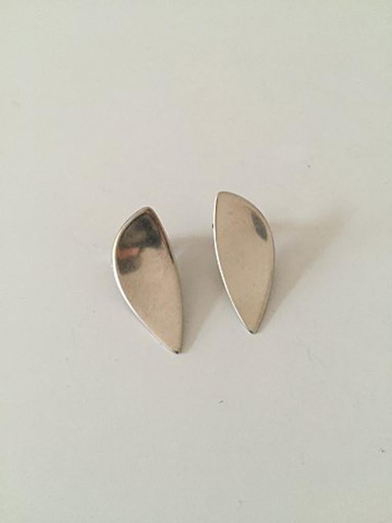 George Jensen earclips made of sterling silver. Measures 2 cm / 0 25/32 in. Weighs 9 g / 0.30 oz.