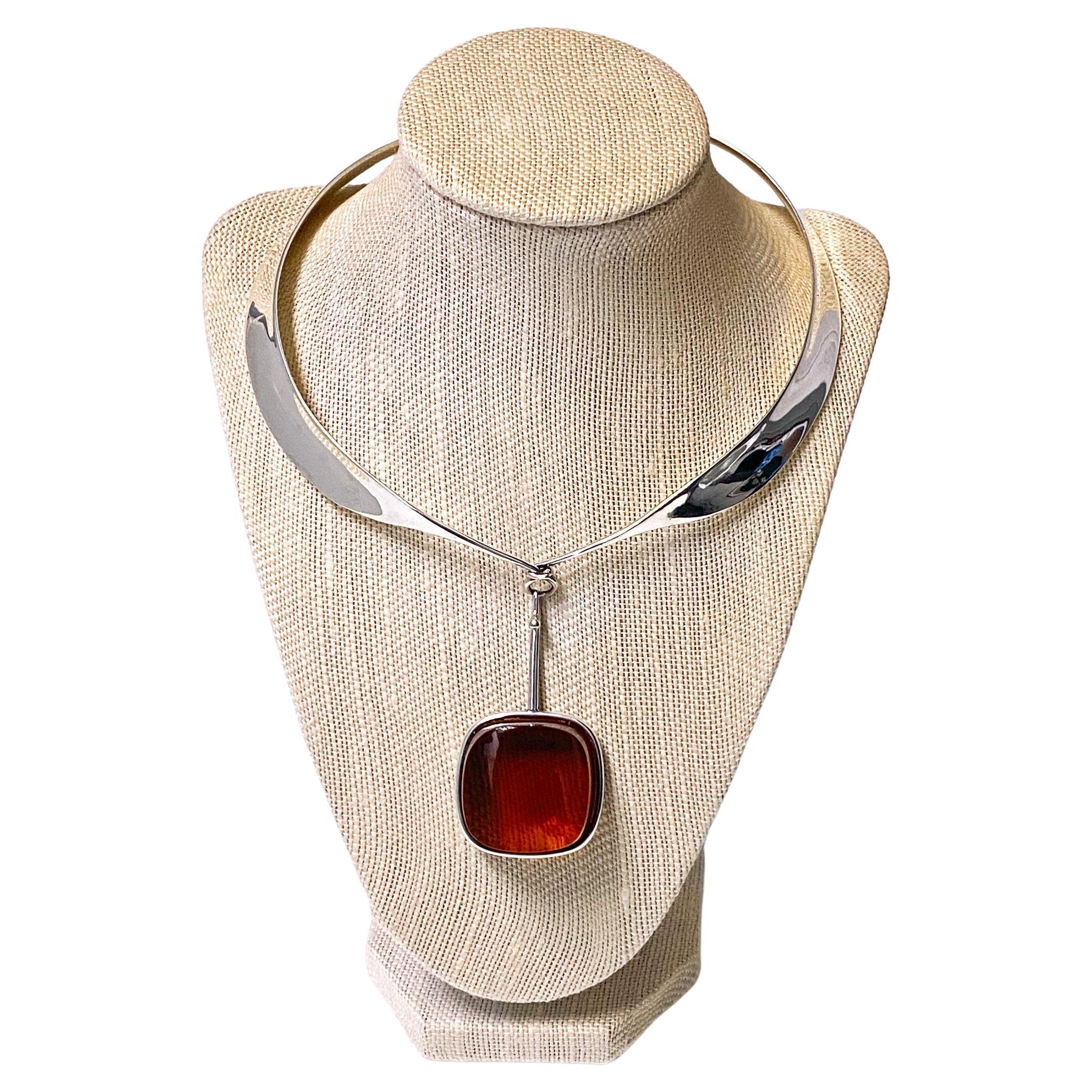Vivianna Torun Bulow Hube for George Jensen, a rare silver orange brown rock crystal pendant on collar, Denmark, C. 1969, #160, stamped Georg Jensen in a dotted oval, Denmark, Torun, 160 and 925S. Will fit up to 19-inch neck, pendant drop 2.9