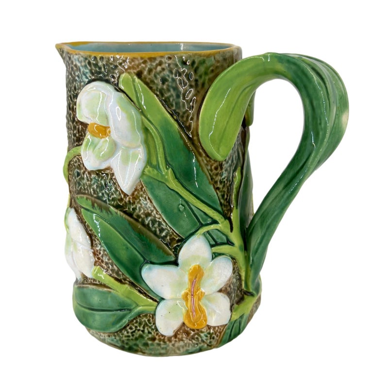 Molded George Jones Majolica Pitcher with Trompe L'oeil White Orchids, English, c. 1875 For Sale