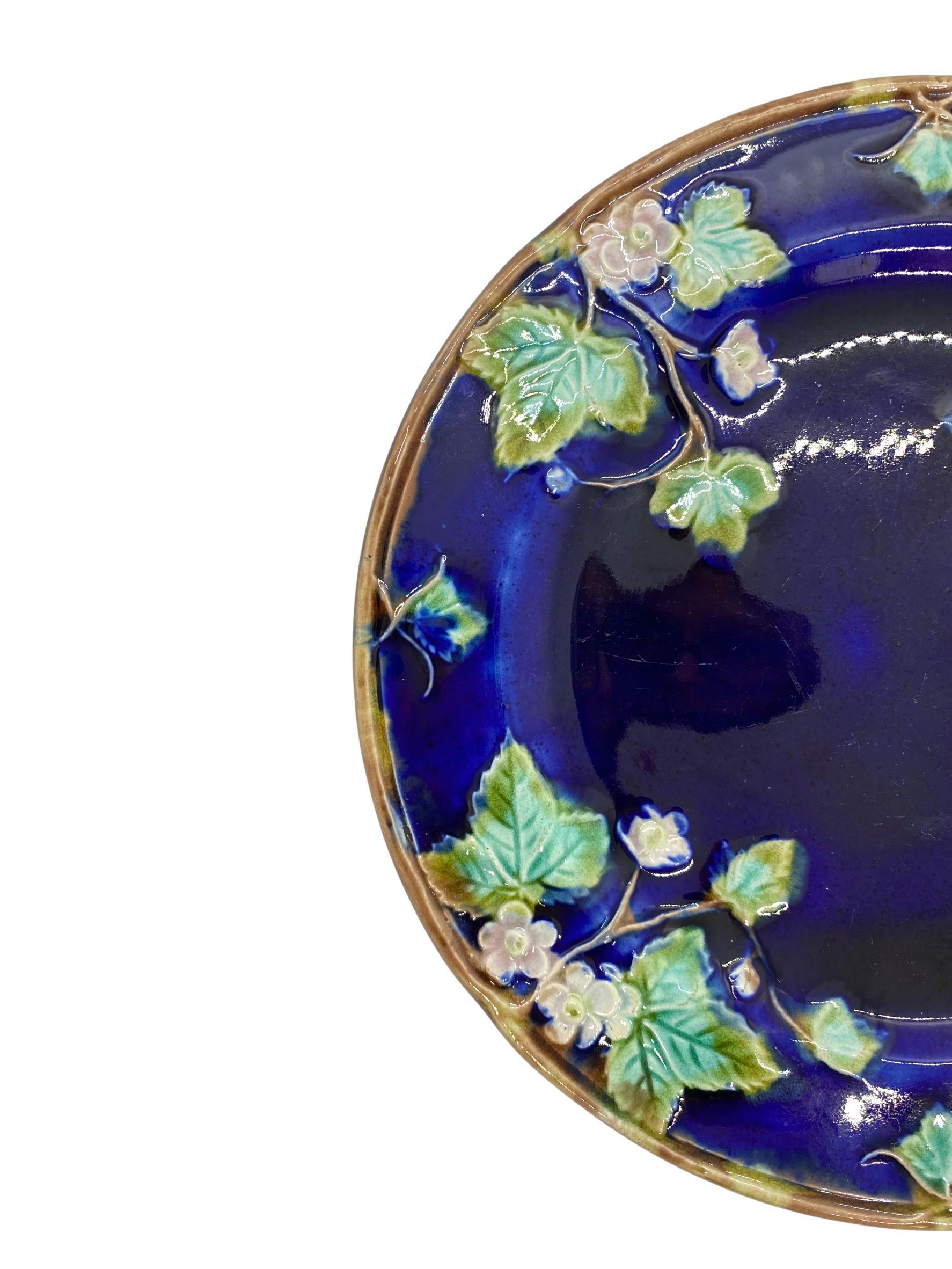 George Jones Majolica plate strawberry blossoms on cobalt ground, ca. 1880, Diameter: 7.5
This design is included in the Karmason Library of the Majolica International Society, I.D. Number: 4388, KL Number: KL002924P. 
For 30 years we have been