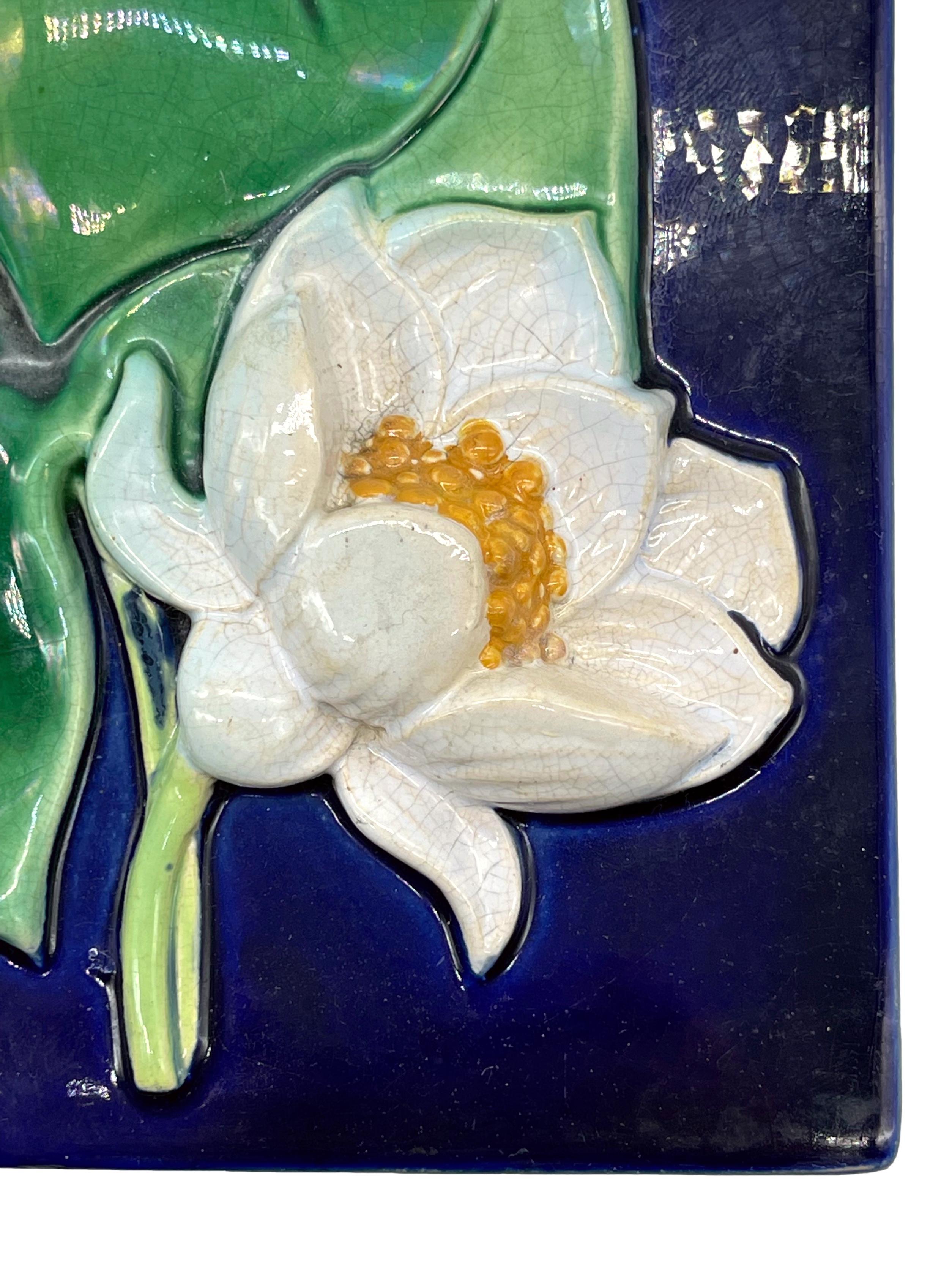 Molded George Jones Majolica Trompe L'oeil Waterlily Tile, Cobalt Ground, ca. 1880 For Sale