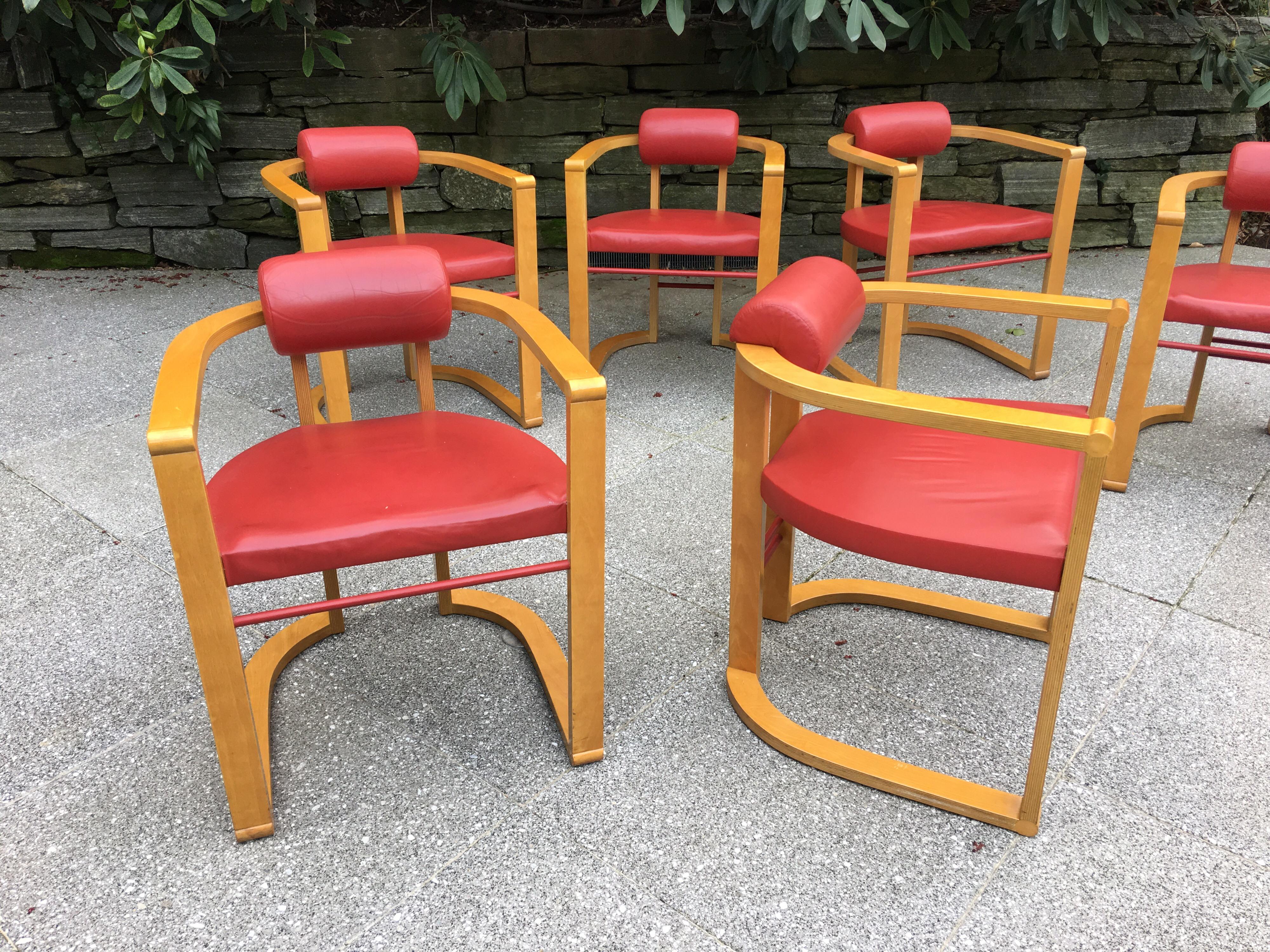 Set of 6 George Kasparian dining chairs in a blond finish with red leather Upholstery. Wood is made up of laminated layers of birch or maple. From the original owners, purchased in 1988. Shown in last photo with a custom designed burled maple