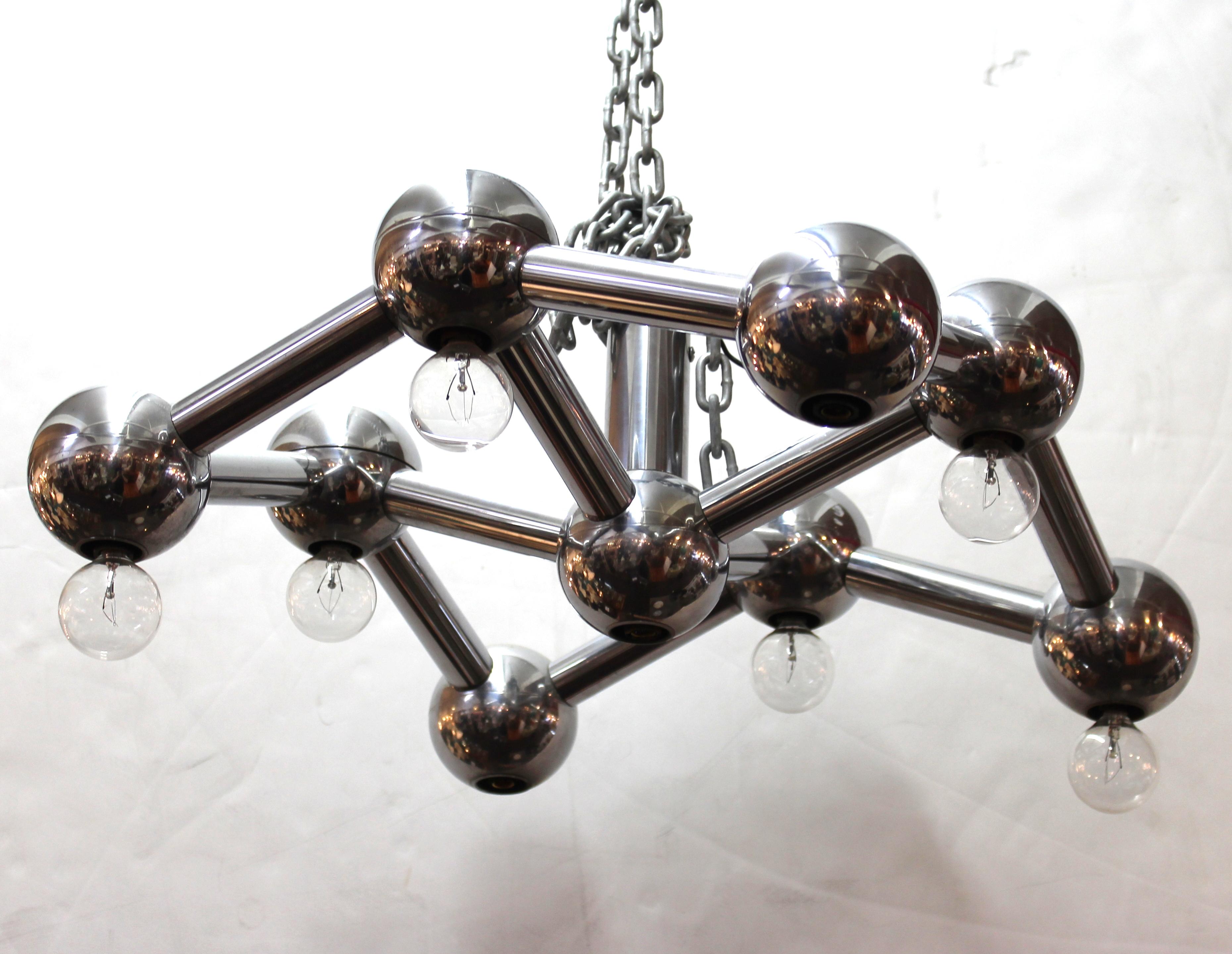 George Kovacs Mid-century modern Molecular Style chandelier with chrome structure. The piece is in great vintage condition.