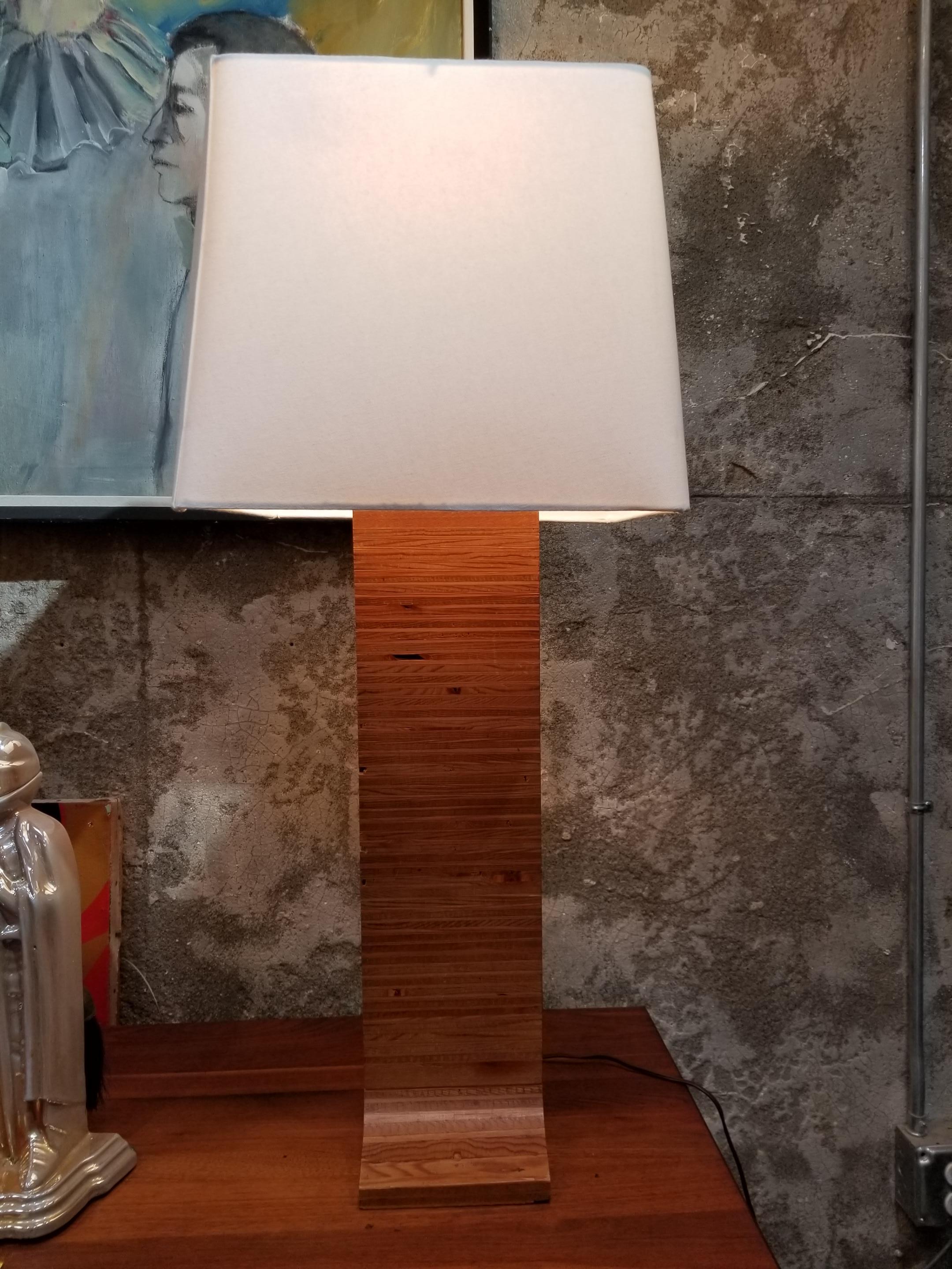 Mid-Century Modern stacked plywood table lamp by Kovacs. Organic modern materials and design with contrasting polished chrome stem and square shade. Retains Underwriters Laboratories / Kovacs paper label on base. Wood base only measures 22