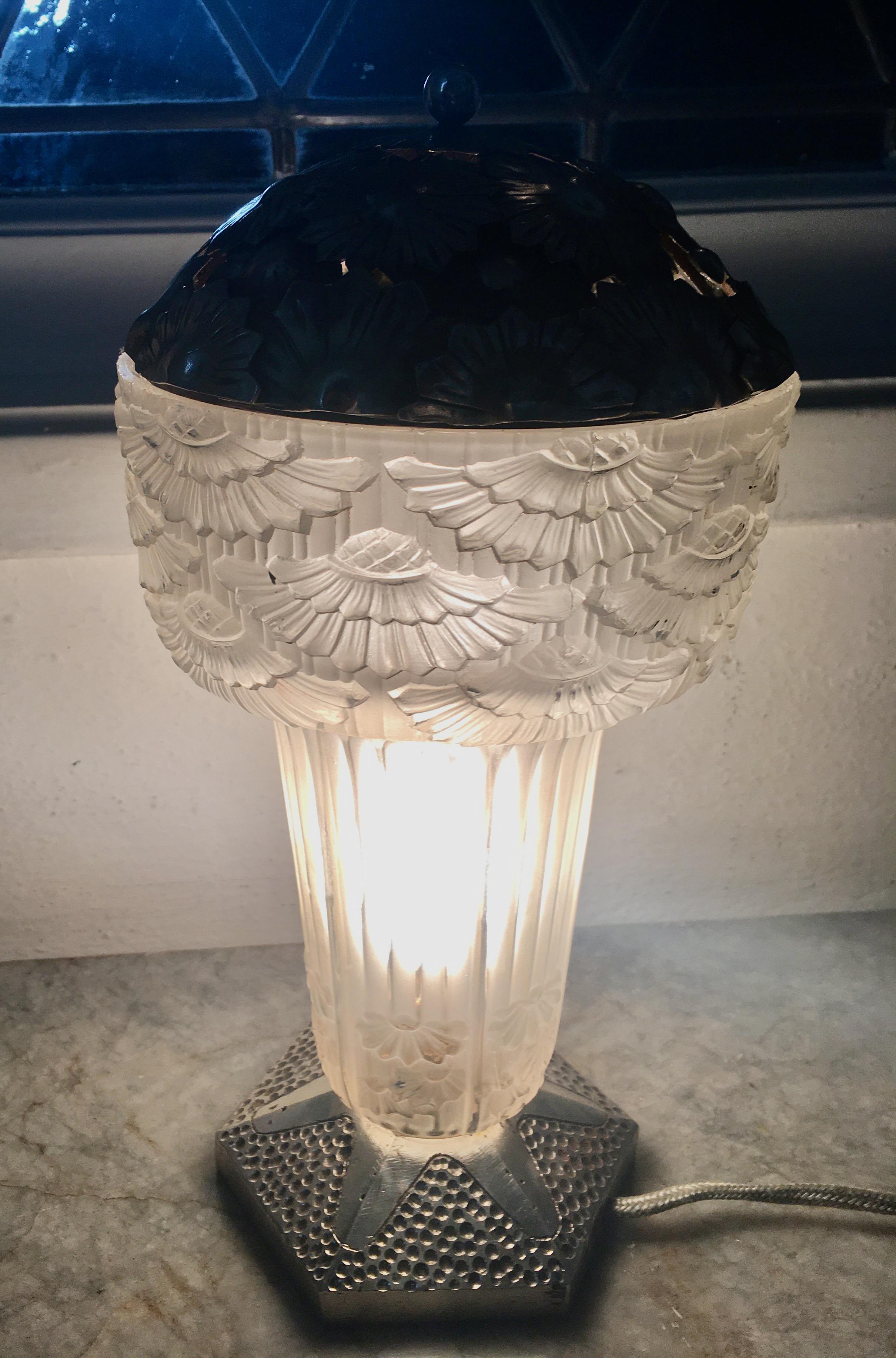 French Art Deco table lamp by Georges Leleu. Rare original piece with detailed glass and detailed metalwork in nickeled bronze. The glass is signed G. Leleu in the glass and there is a 4 digit number above it. So great to see some of these survive