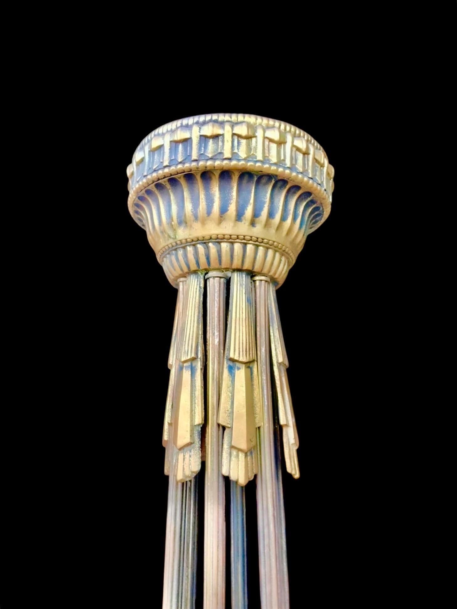 Georges Leleu was a prominent French designer renowned for creating Art Deco chandeliers during the early 20th century, notably in the 1920s and 1930s.
His chandeliers are characterized by:
	•	Use of nickel-plated bronze or gilded bronze