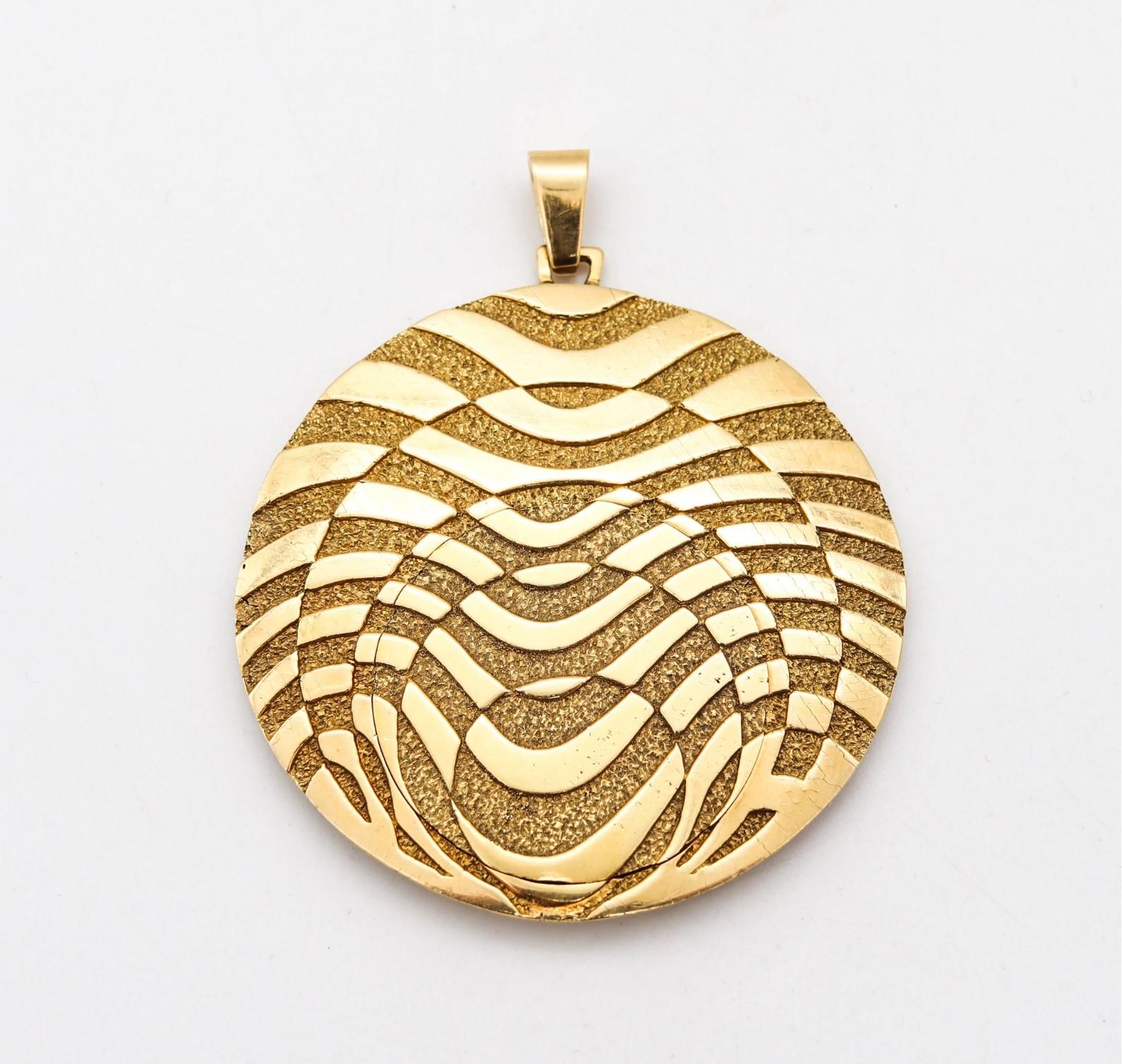An Op-Art pendant watch by George L'Enfant for Rolex Watch Co.

A fantastic and extremely rare piece, created in Paris France at the atelier of L'Enfant for the Rolex Watch Co, back in the 1970's. This pendant watch has been crafted in solid yellow