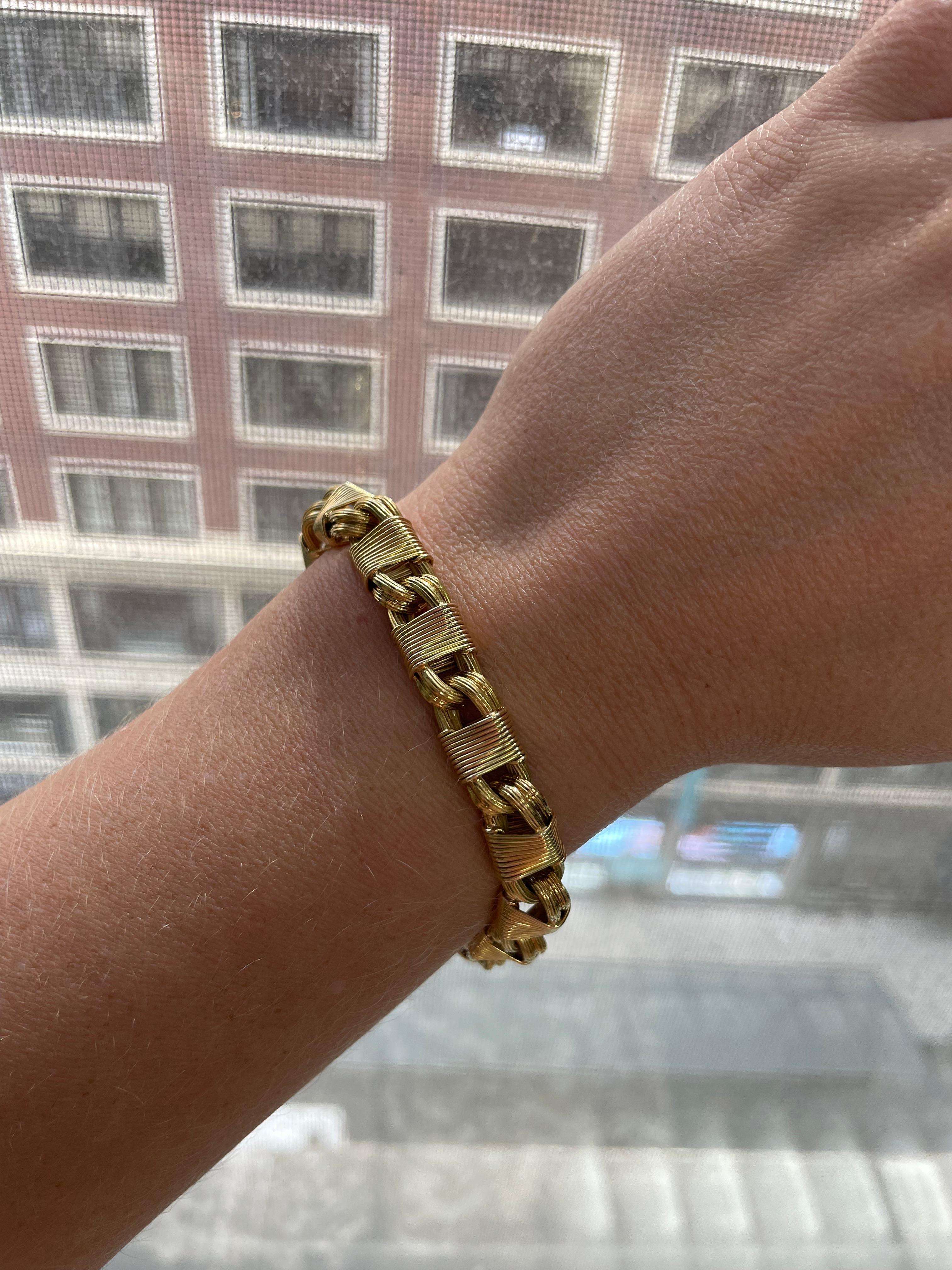 This one of a kind bracelet created by the iconic designer, George L'Enfant for Tiffany and Co. is beautifully made with all hand wound wirework and engraved links. Produced in the 1960's with 18 karat yellow gold, George L'Enfant was a well known