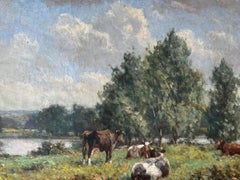 Impressionist English landscape with cows, trees during the Summertime