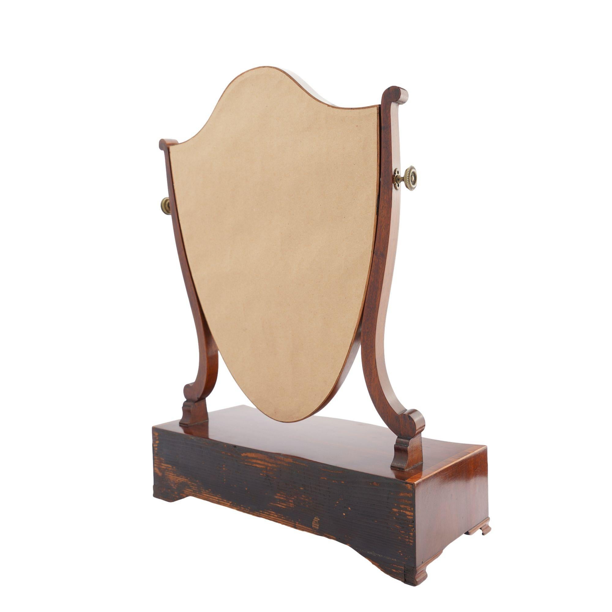 Brass George lIl mahogany dressing mirror on a serpentine box stand, 1790 For Sale