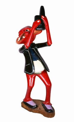 Sculpture of a red figure / - The crazy dance of life -