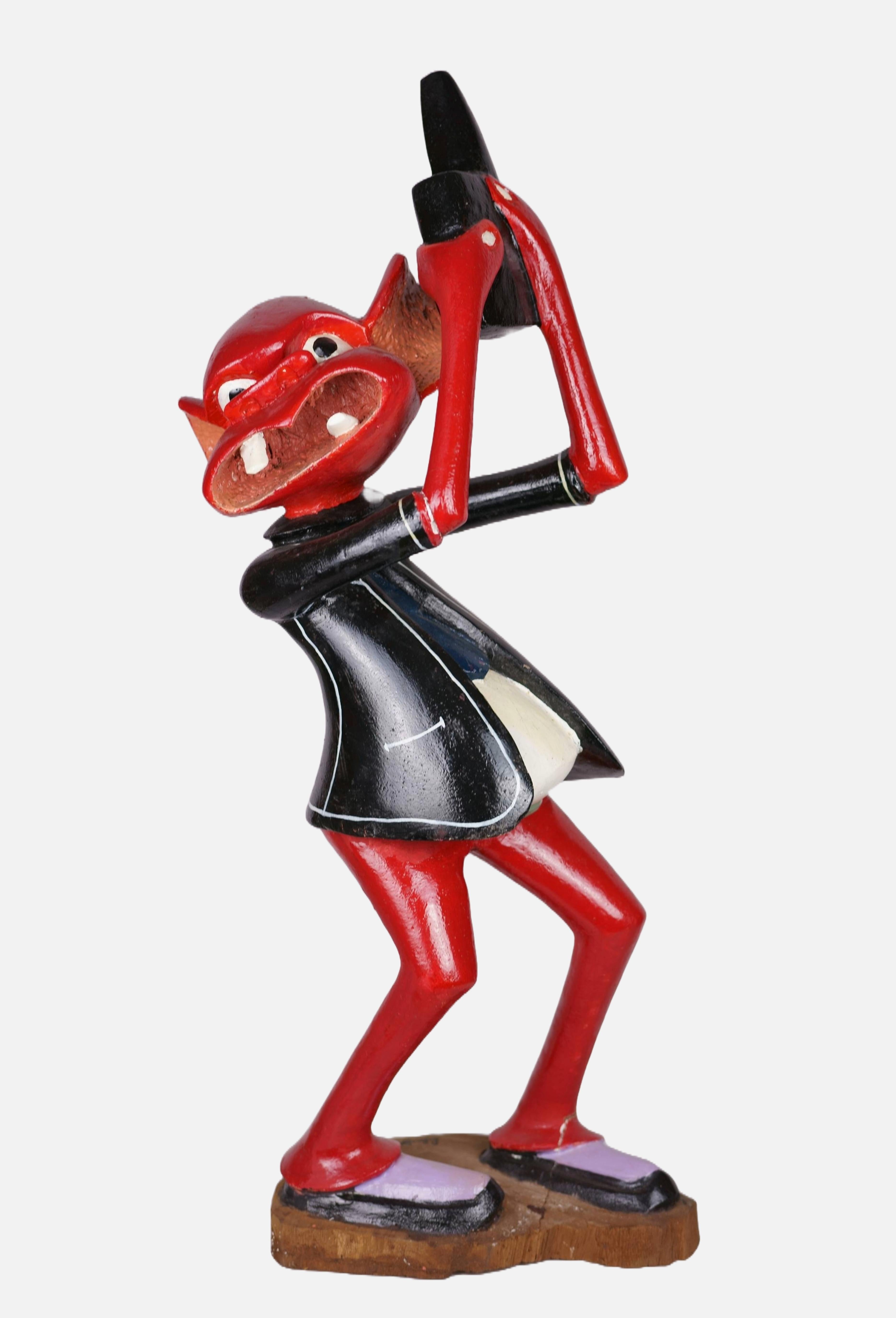 Sculpture of a red figure / - The crazy dance of life -