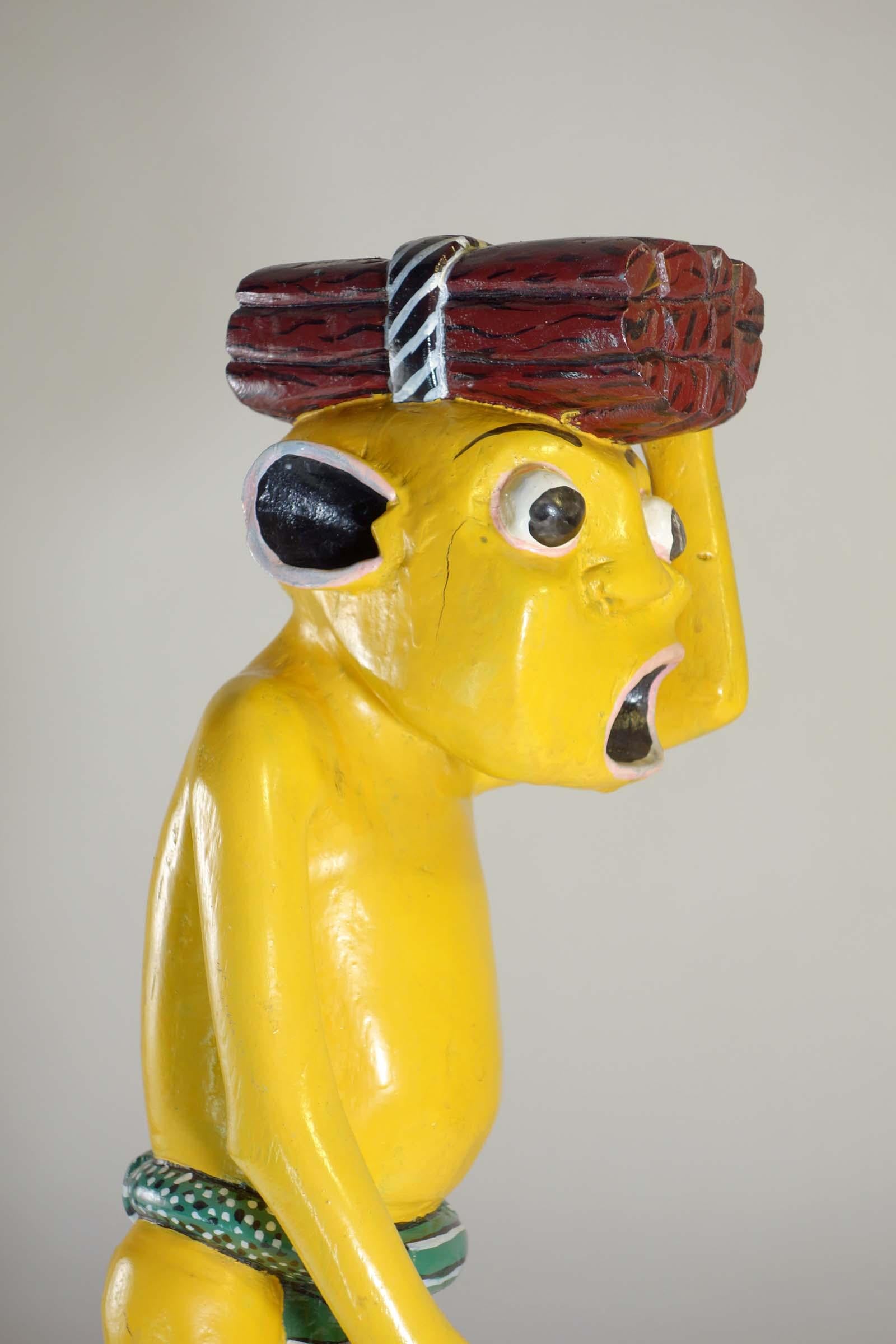 Tanzanian George Lilanga African Art Yellow Figure Wood Enamel Sculpture For Sale