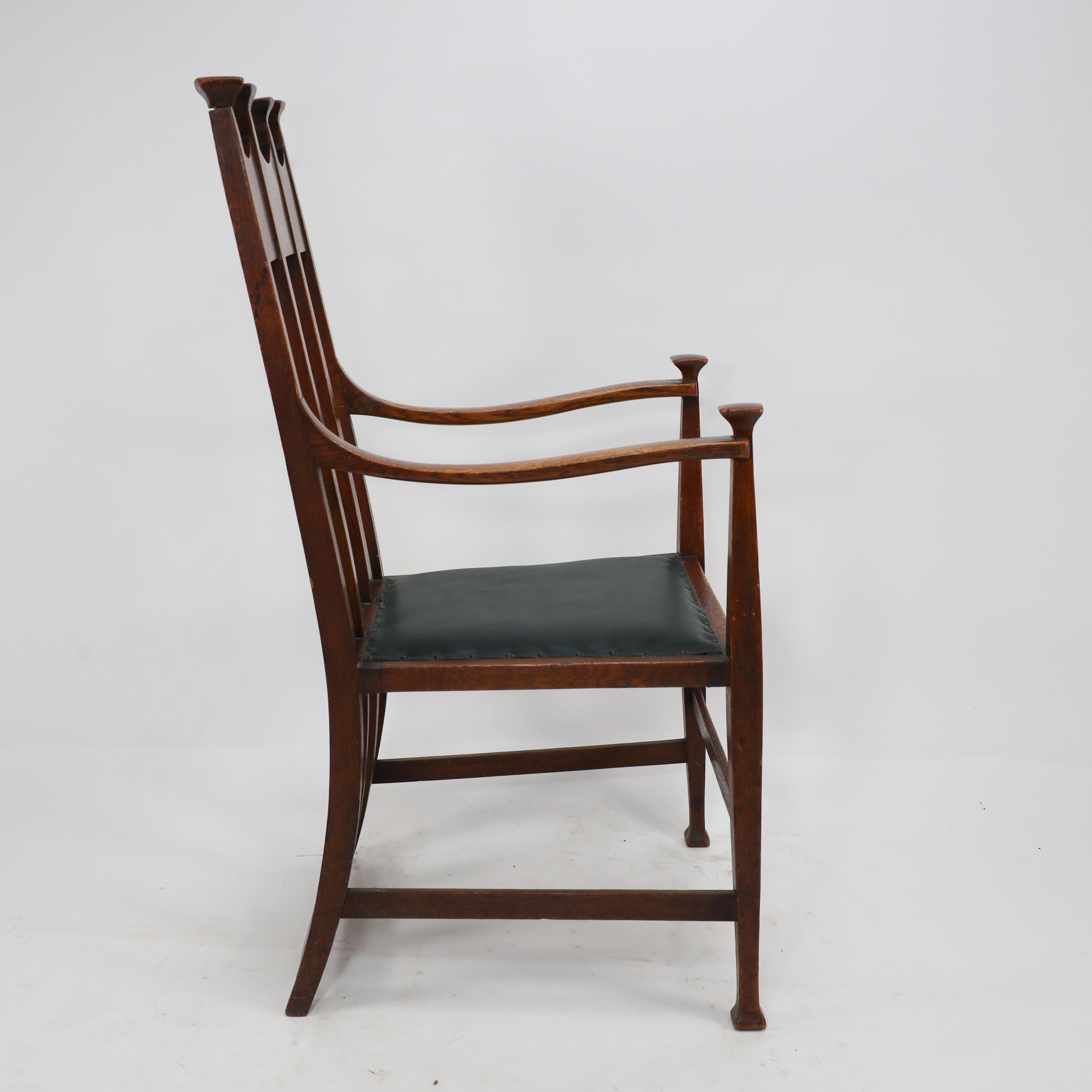 George Montague Ellwood. Made by J S Henry. A rare set of ten oak dining chairs. For Sale 9