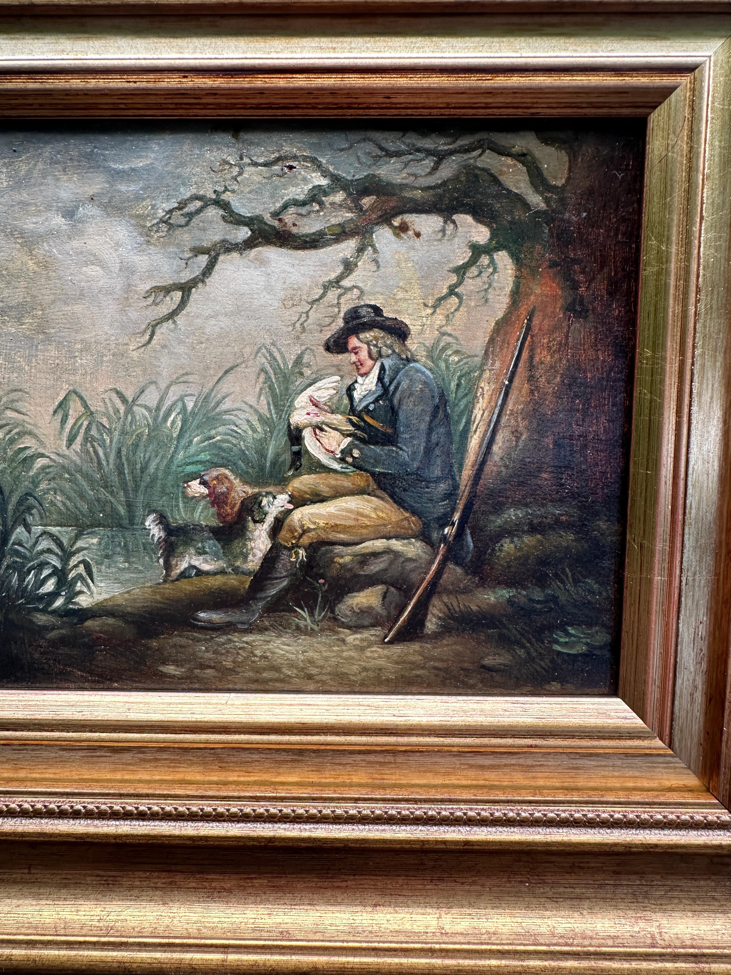 19th century English Antique, man in a landscape with his Spaniels and gun - Painting by George Morland