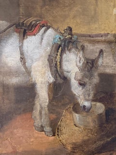 19th century Victorian English Boy seated in a barn feeding his dog and donkey