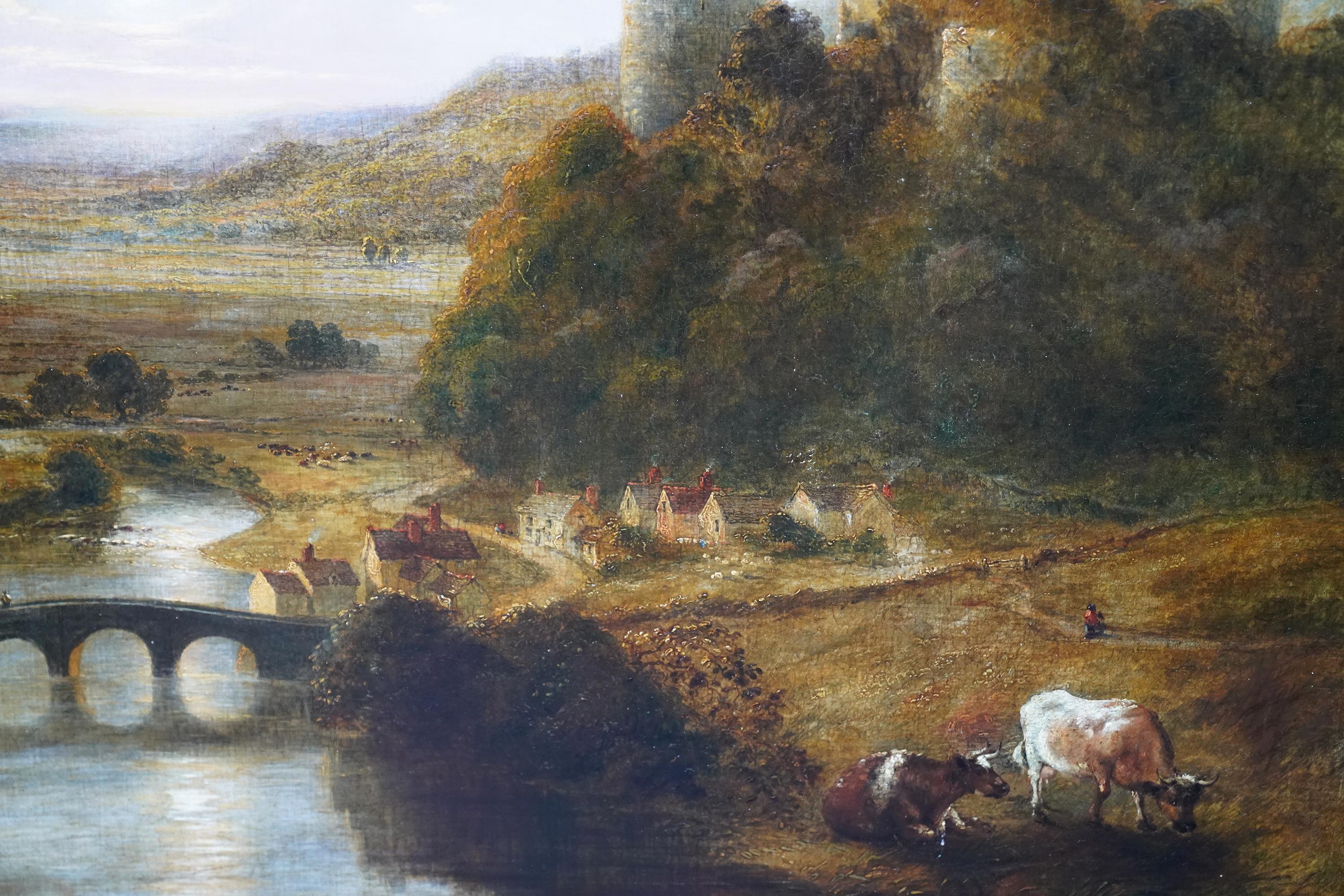 This stunning large 19th century landscape oil painting is attributed to follower of Joseph Turner, possible George William Mote.  Painted circa 1850  it is a panoramic landscape looking down across a valley, past cows in the foreground to a bridge,