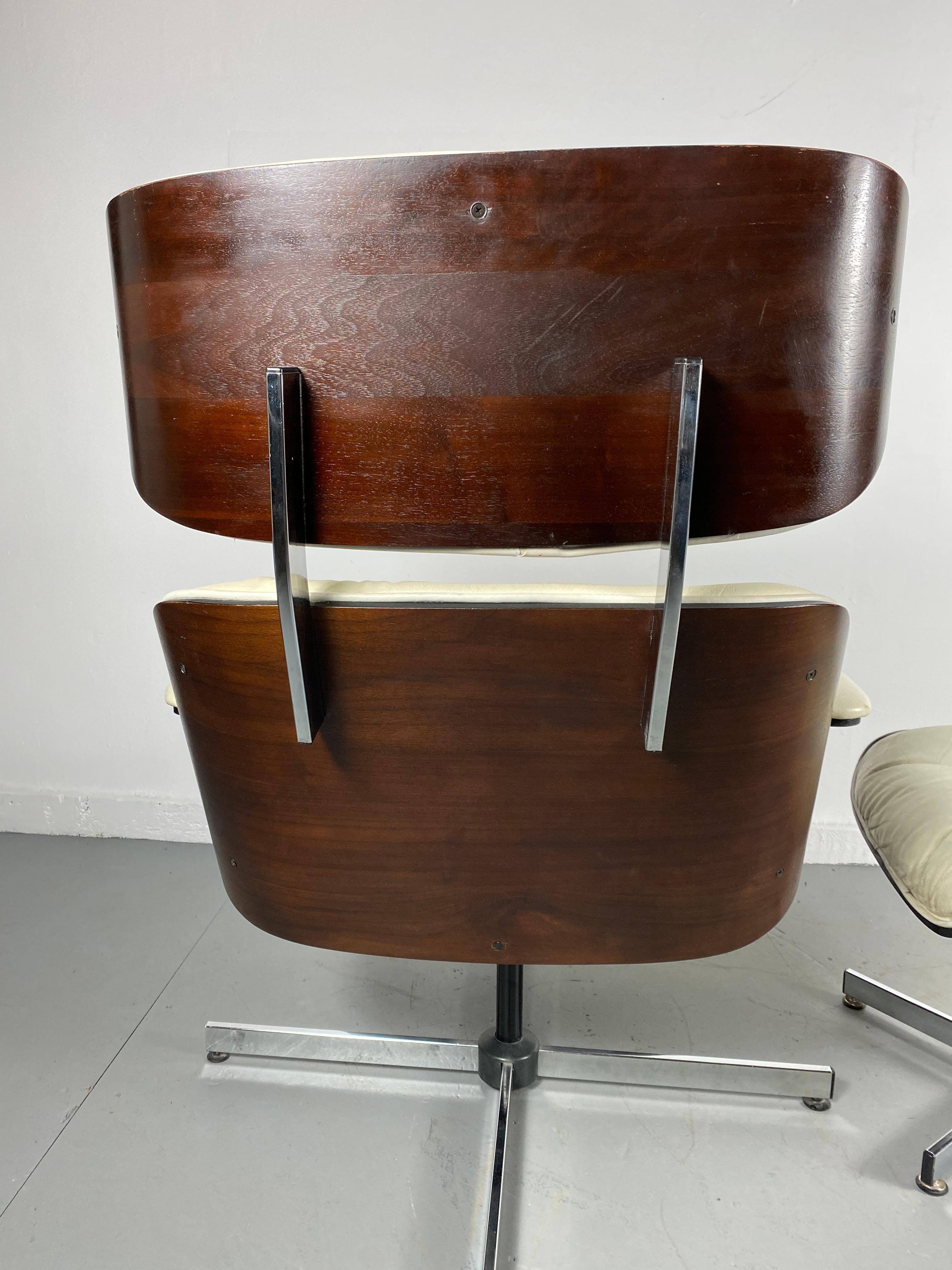 George Mulhauser plywood swivel-tilt lounge chair and ottoman for Plycraft. Classic midcentury lounge chair and ottoman manufactured by Plycraft, designed by George Mulhauser, designed after the famous lounge chair and ottoman by Charles Eames,