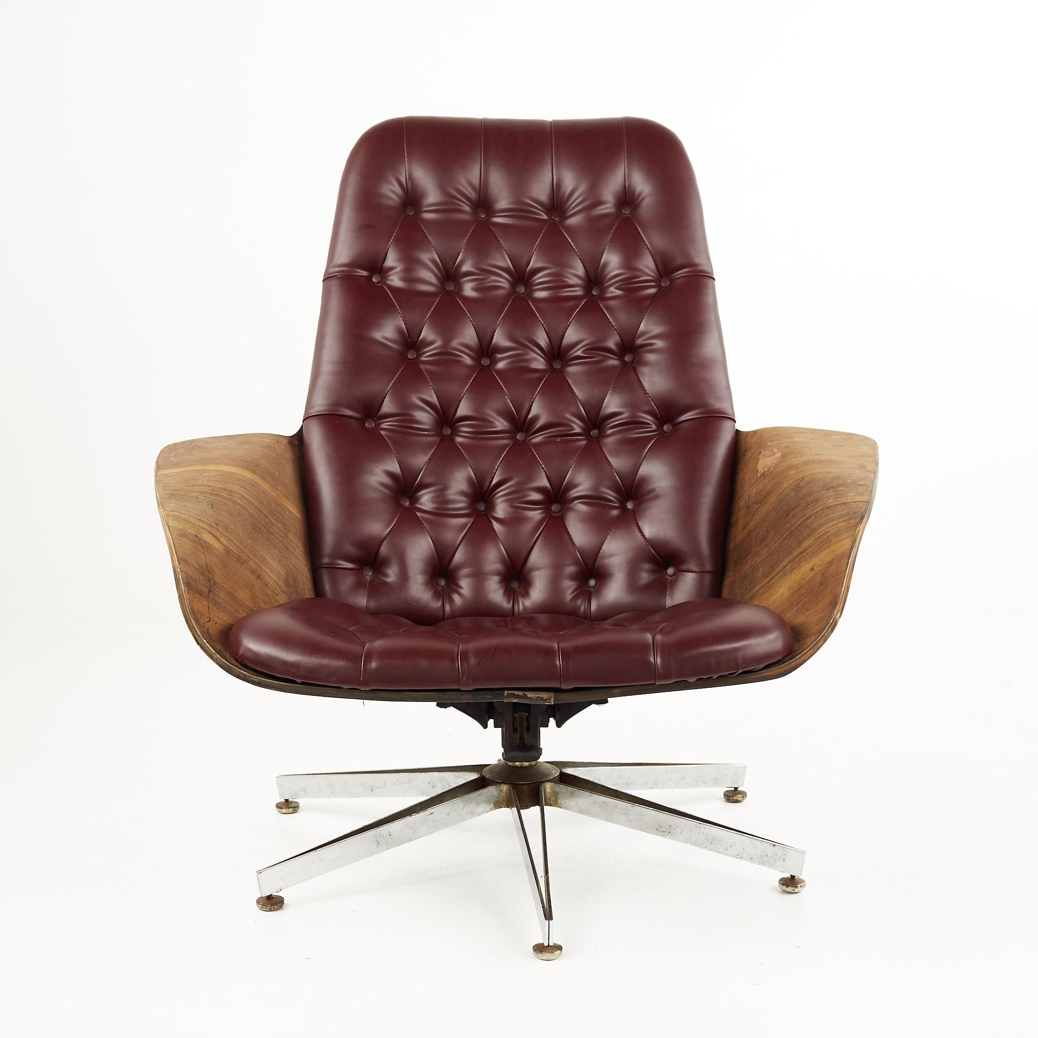 George Mulhauser for Plycraft Mid Century Tufted walnut lounge chair.

The lounge chair measures: 35.5 wide x 35 deep x 36.5 high, with a seat height of 13.5 inches and an arm height/chair clearance of 19.75 inches.

All pieces of furniture can