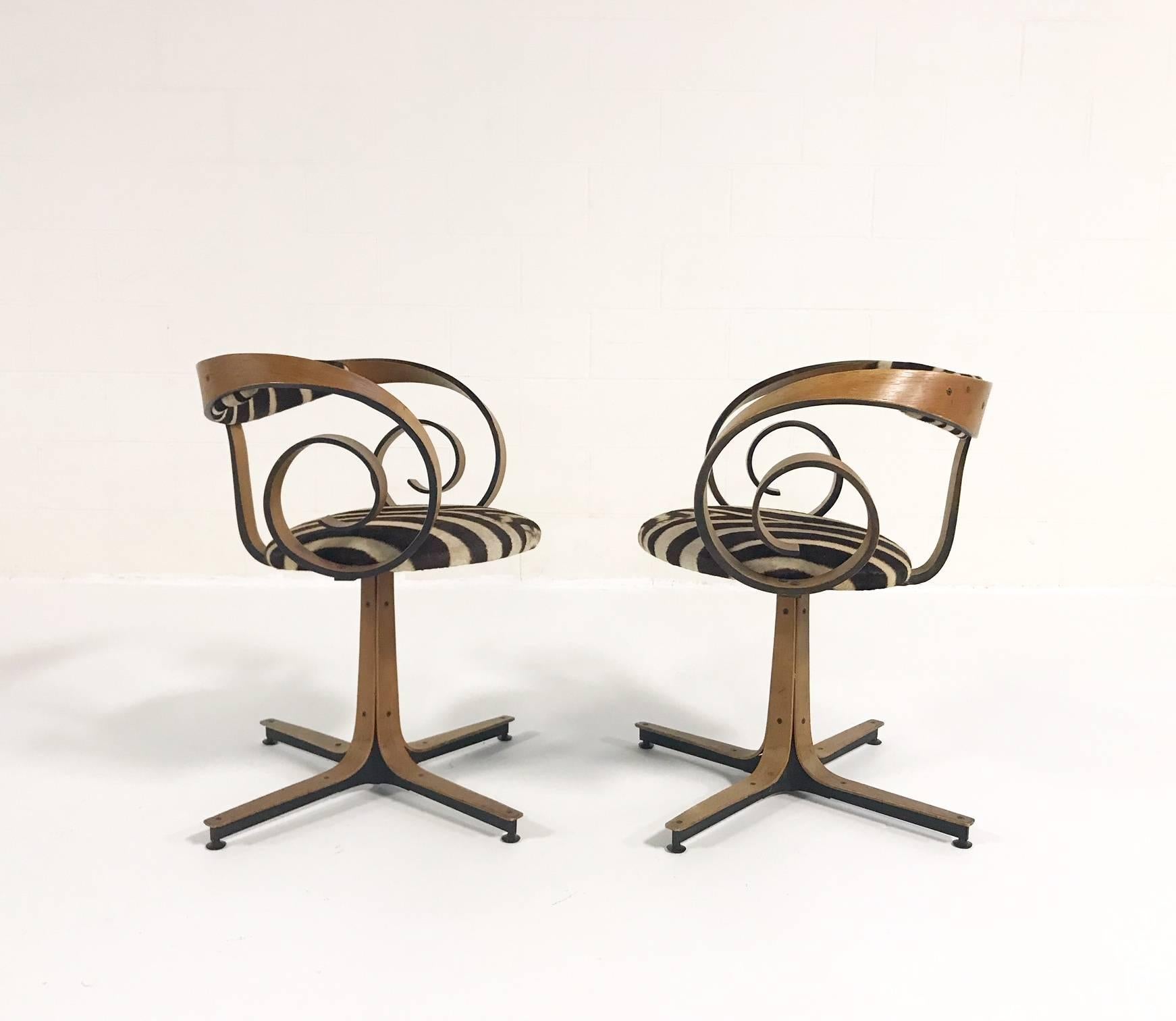 These Mulhauser chairs are a great example of why we do what we do, circa 1965. Collecting interesting, vintage pieces and elevating their status to something special by restoring and reupholstering in the ever-cool graphic beauty of zebra hide. We