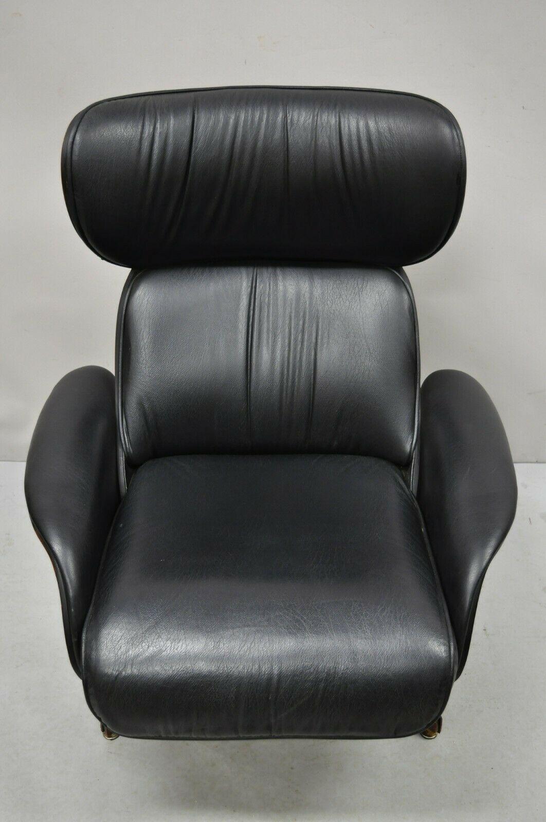 George Mulhauser Plycraft Mr. chair walnut black recliner reclining lounge chair. Item features a pop out footrest ottoman, walnut shell back, original black Naugahyde upholstery, beautiful wood grain, very rare vintage item, quality American