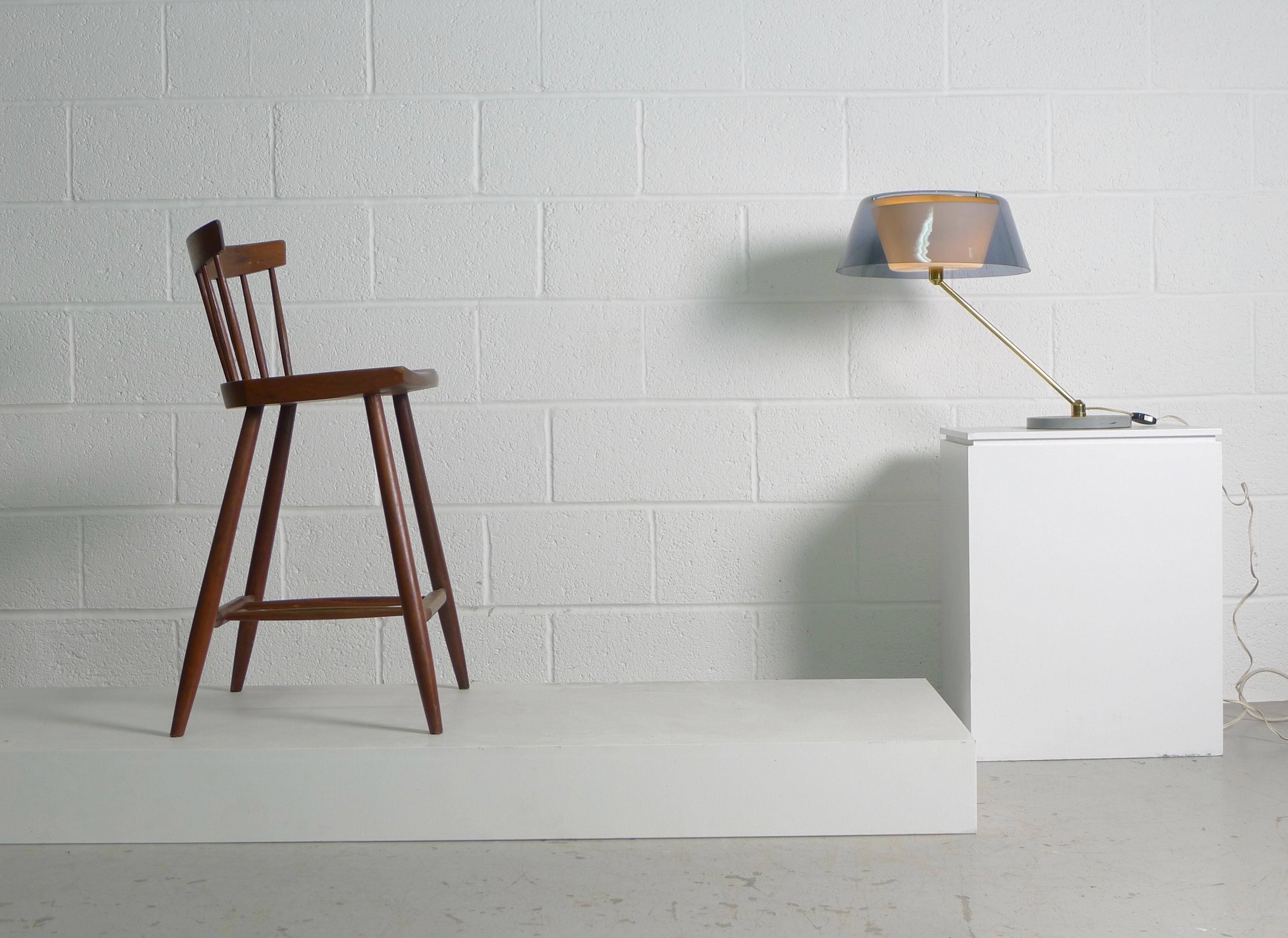 George Nakashima high stool, studio made piece in English walnut, circa 1960.