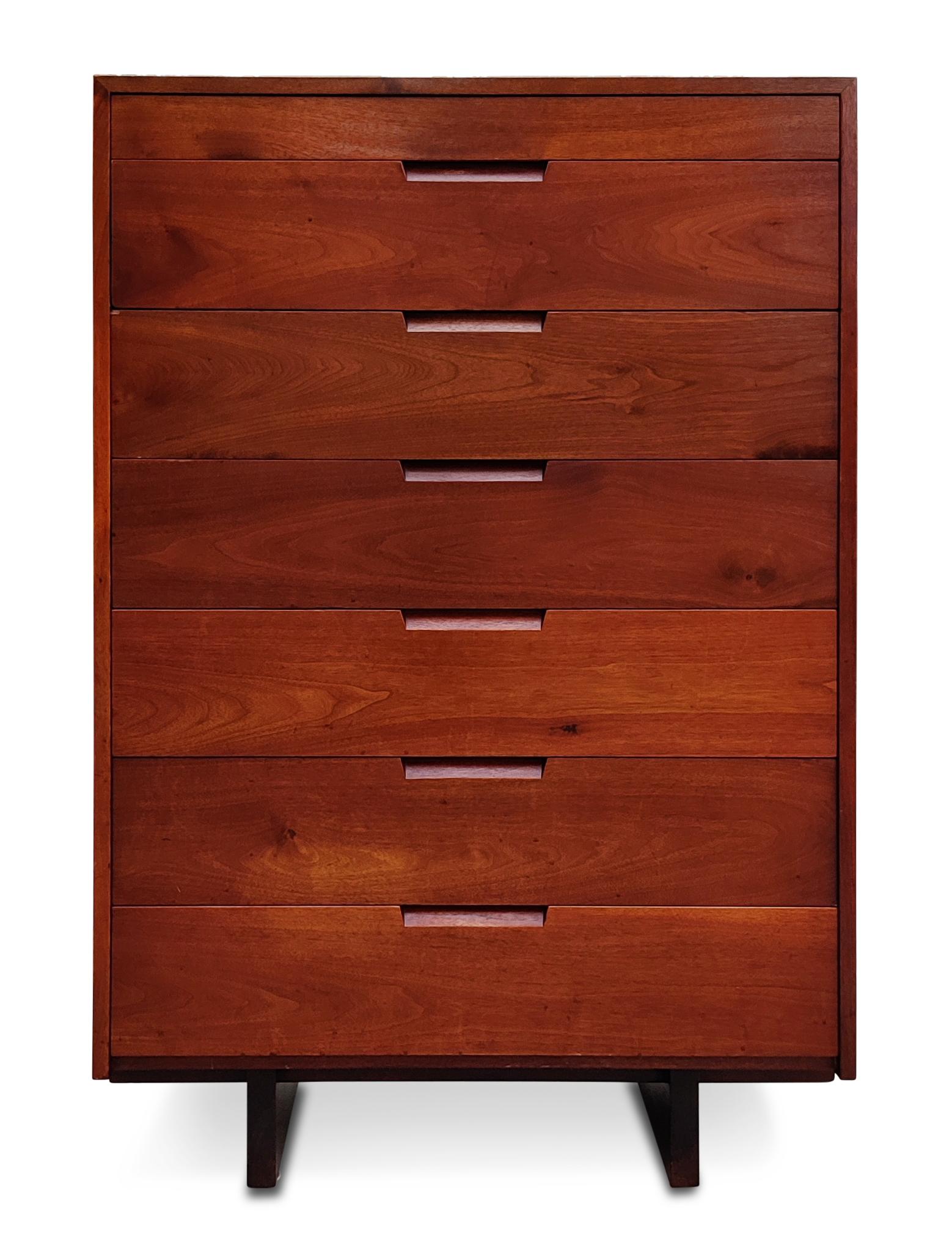 Outstanding execution and simplicity of design leaving the wood to speak for itself as Nakashima always strived for. Features seven drawers with rich dark walnut grain details to top and sides. Prominent dovetail joinery on top and sides. The