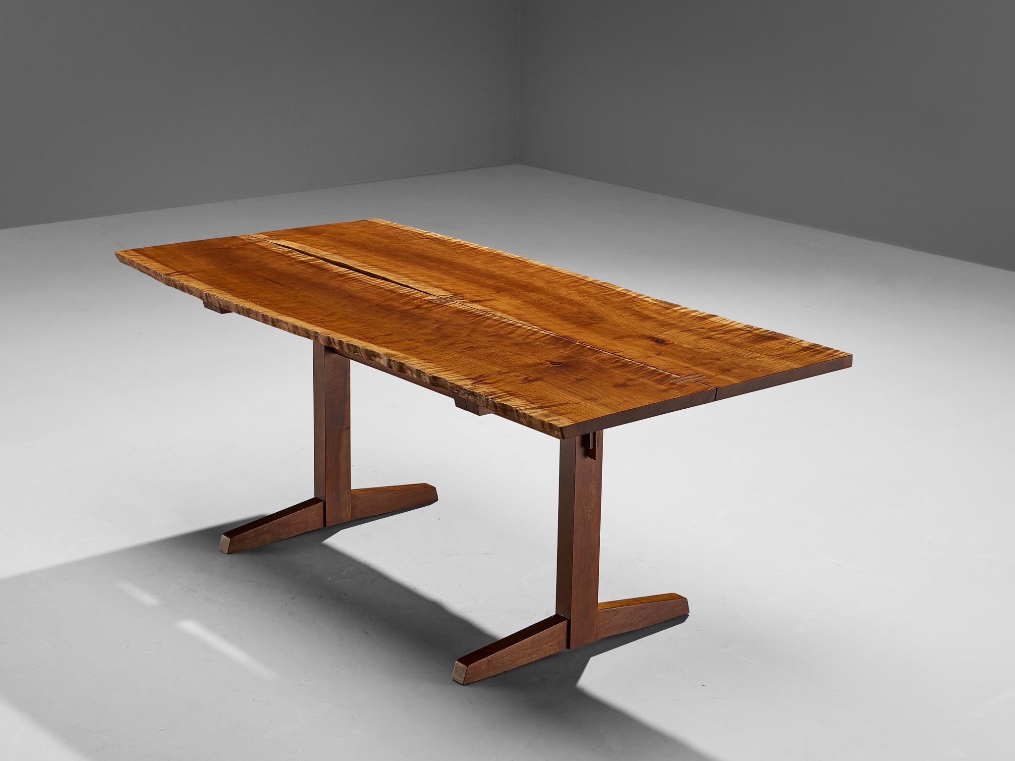 George Nakashima for George Nakashima Studio, boat-shaped ‘trestle’ dining table, cherry, rosewood, United States, 1982

This exquisite dining table was designed by George Nakashima and created in his studio in New Hope, Pennsylvania. American