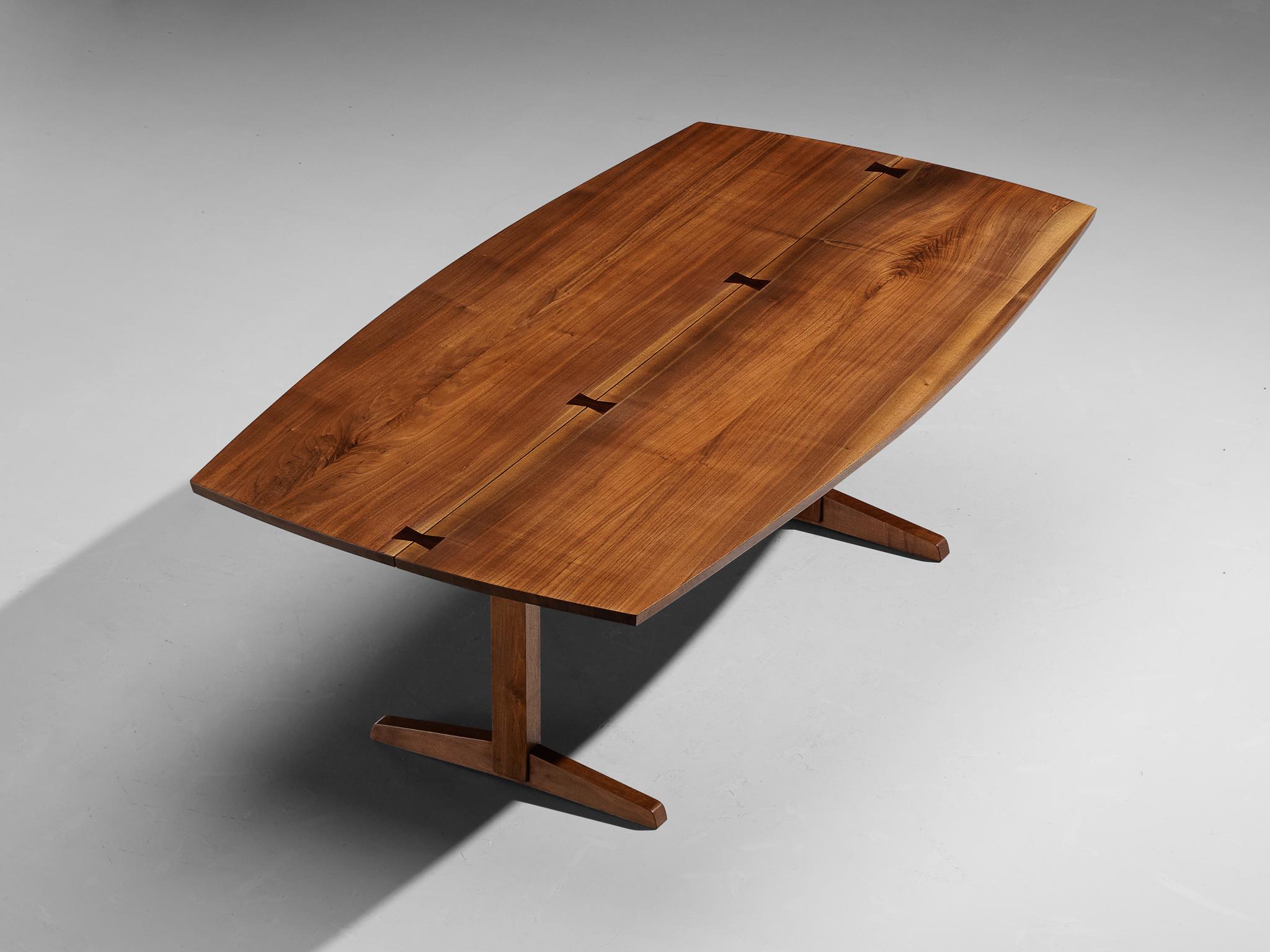 George Nakashima, boat-shaped trestle dining table, walnut, United States, 1959

This exquisite and exceptionally large dining table was designed by George Nakashima and created in his studio in New Hope, Pennsylvania. American woodworker and
