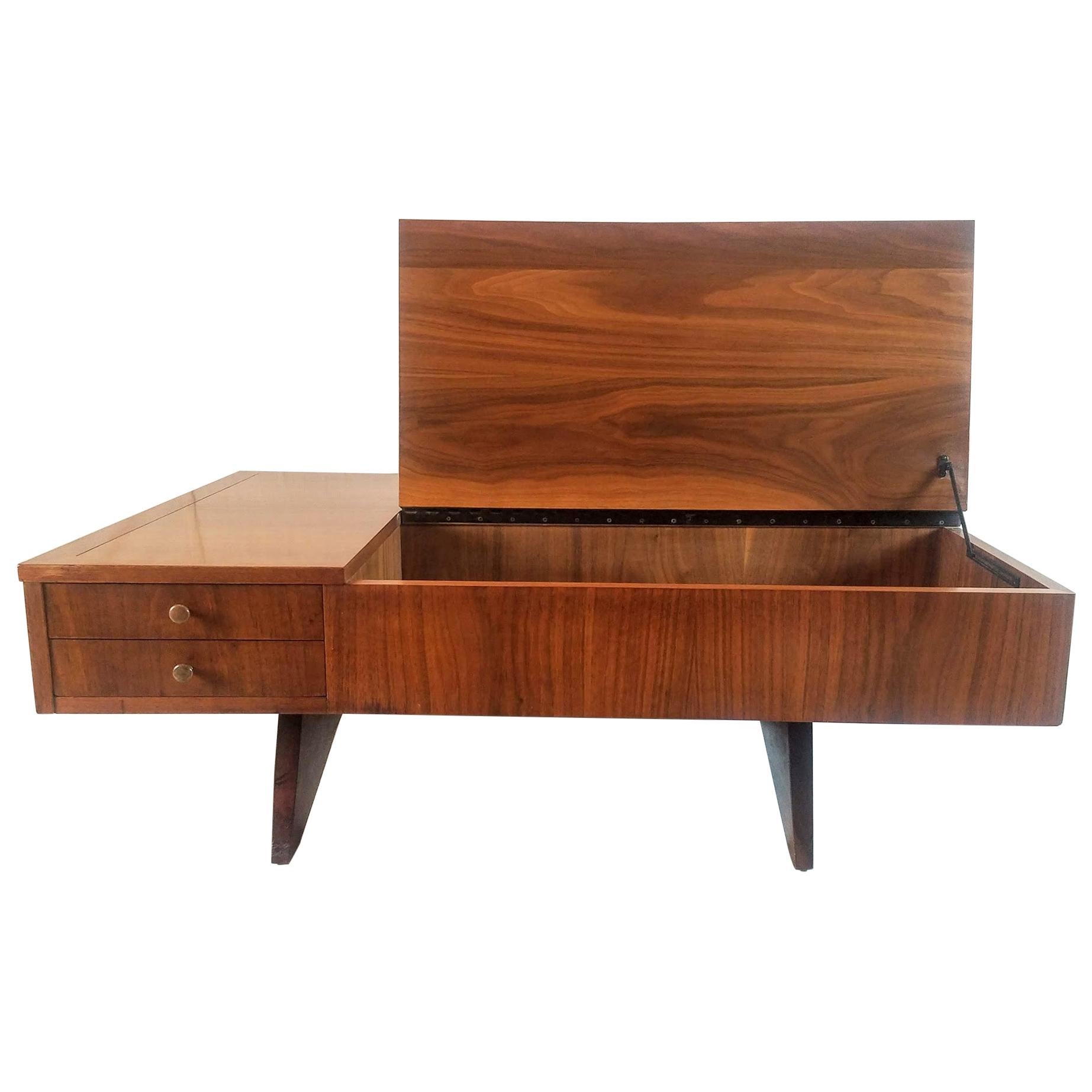 George Nakashima flip-top coffee table model 272 manufactured by Widdicomb in 1960 from his origins line.
The underside of the drawer is stenciled Sundra model 272 dated 1960.
The Origins line was only in production from 1958 until 1963 which is a