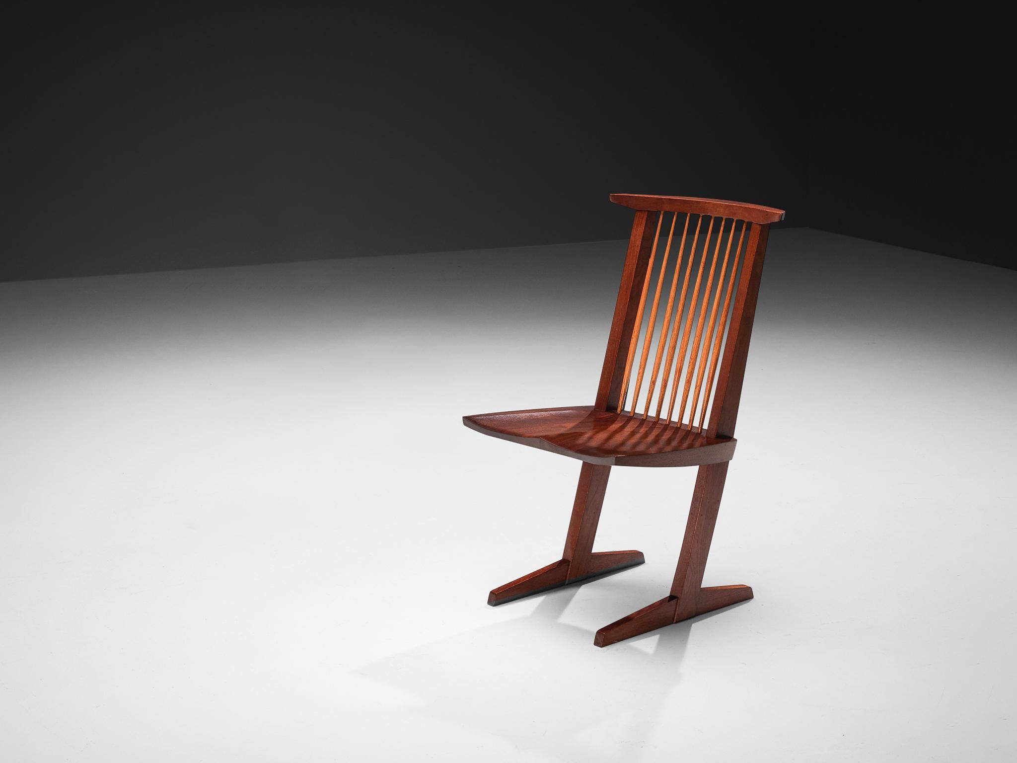 George Nakashima for Nakashima Studio, 'Conoid' chair, walnut, hickory, United States, 1962

This stunning Conoid dining chair is designed by woodwork master George Nakashima and made in 1962. The most striking feature of this chair is its