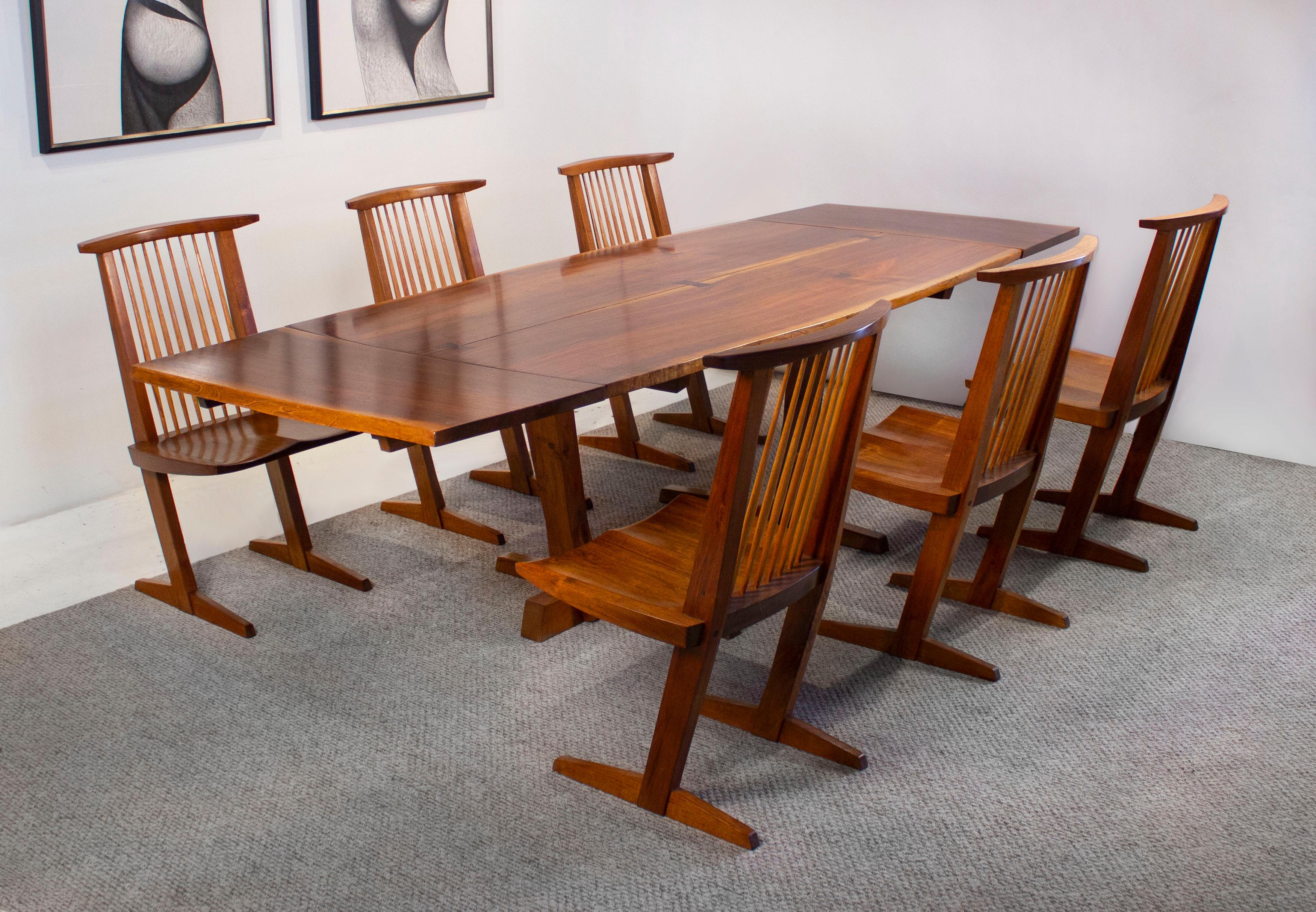 This early George Nakashima Dining set was custom ordered from the Nakashima Studio in 1963 and has been in the original owner's possession for almost 60 years. It was well cared for and is ready for another half of a century of use. 

The table