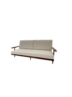 George Nakashima “Cushion” three seat walnut sofa with arms, USA, 1961