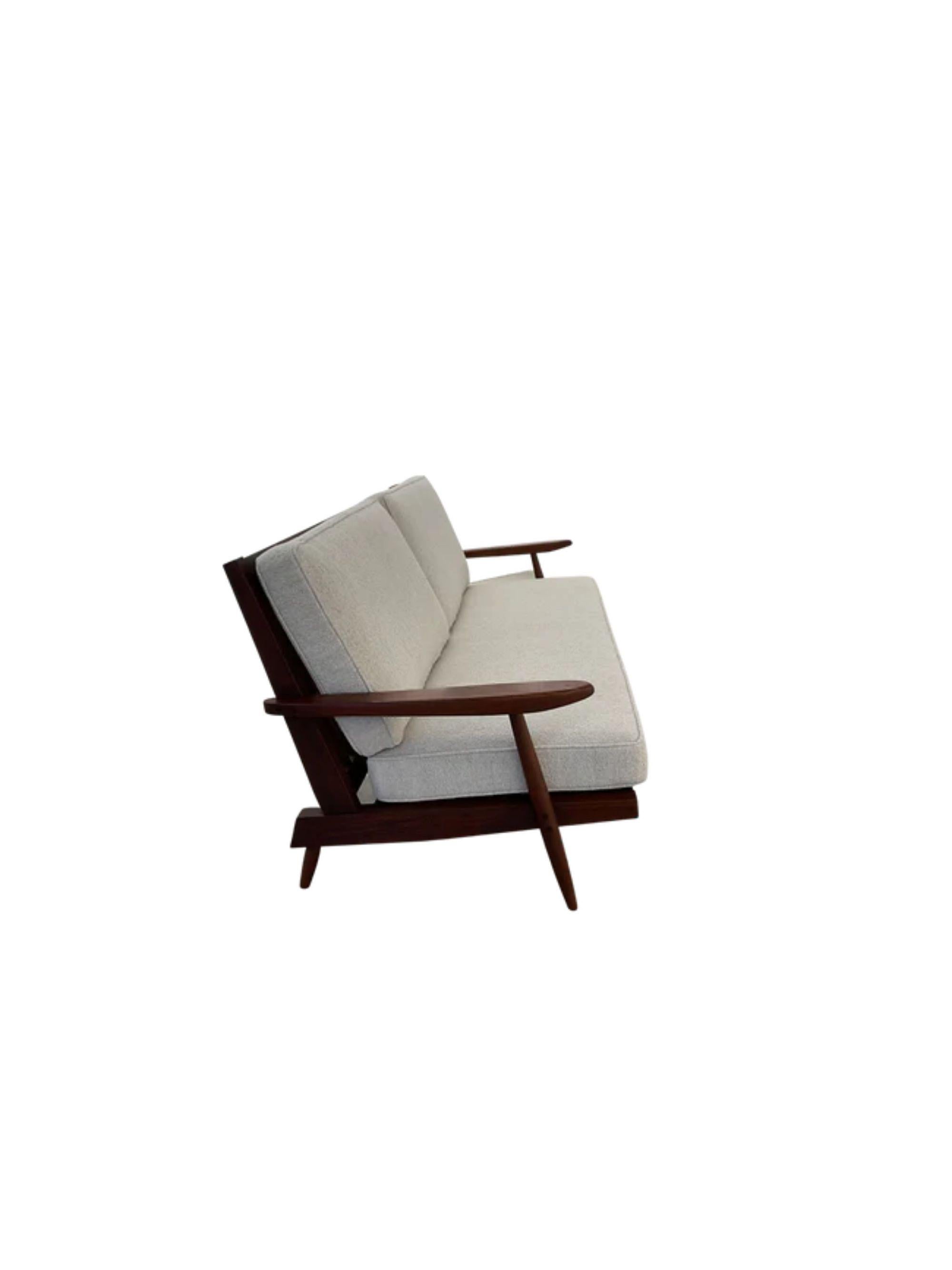 Mid-Century Modern George Nakashima “Cushion” three seat walnut sofa with arms, USA, 1961