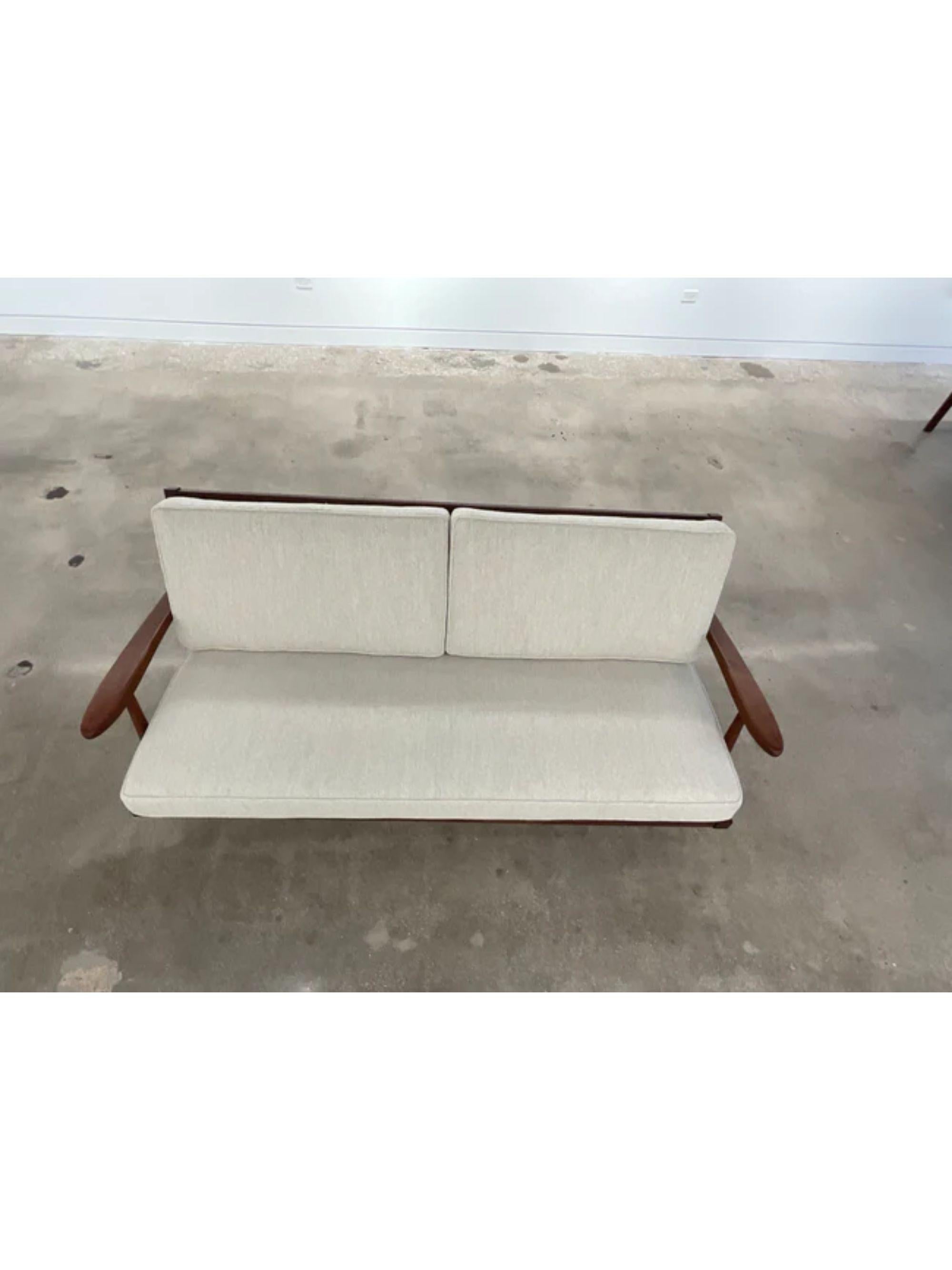 Upholstery George Nakashima “Cushion” three seat walnut sofa with arms, USA, 1961