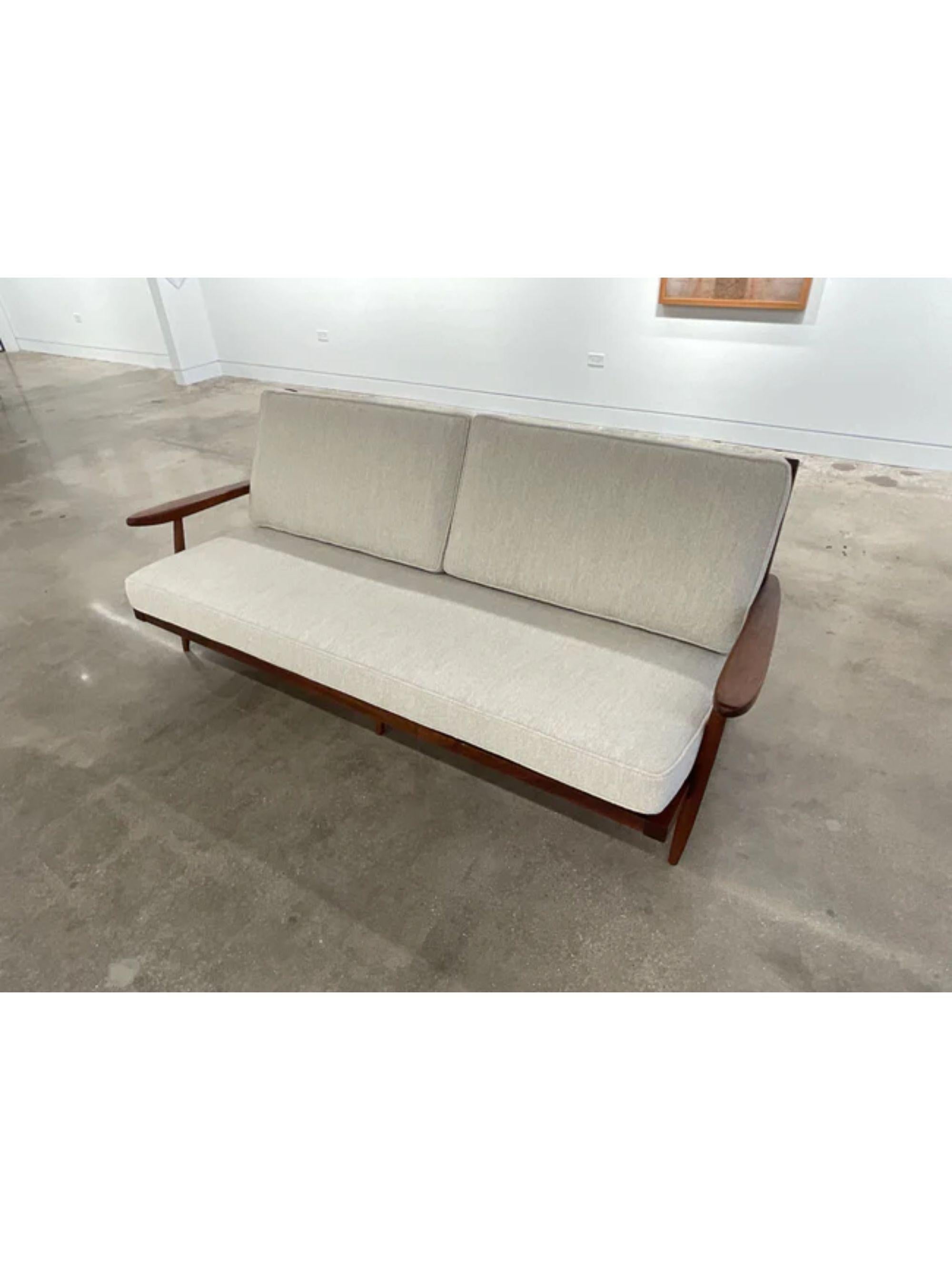 George Nakashima “Cushion” three seat walnut sofa with arms, USA, 1961 1