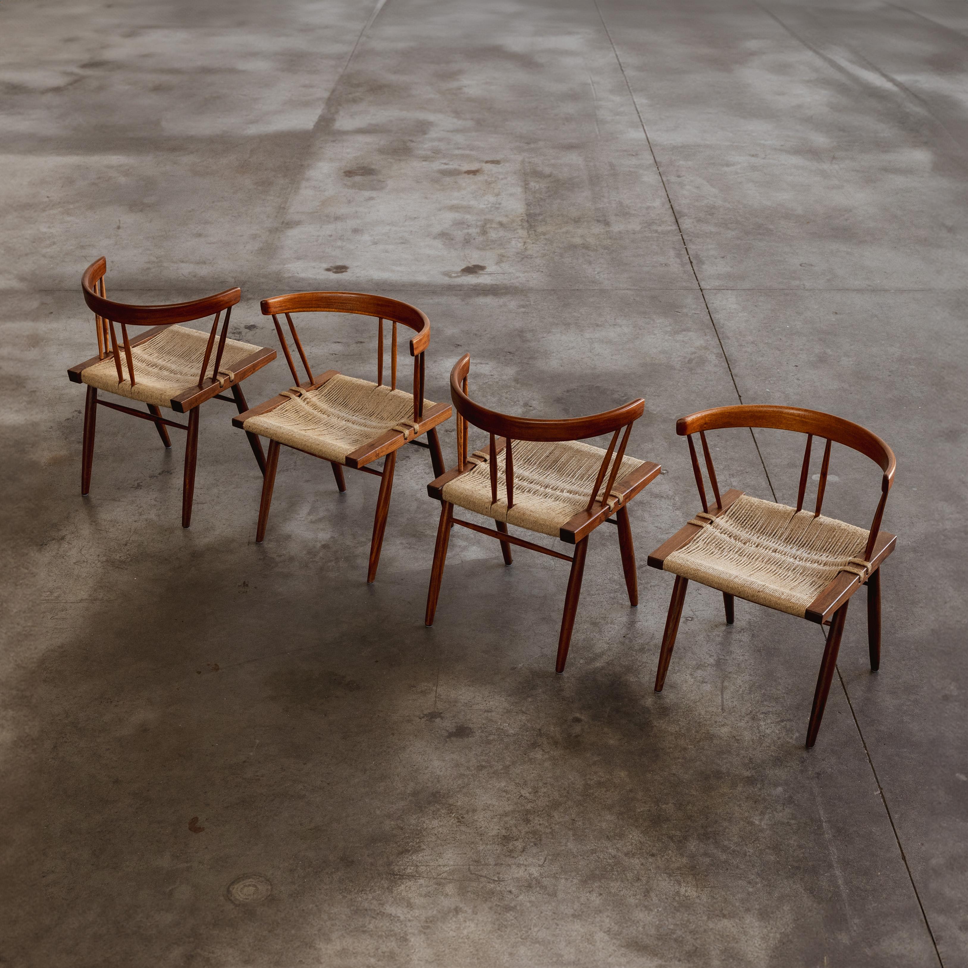 George Nakashima dining chairs, seagrass and wood, USA, 1947, set of four

George Nakashima designed these dining chairs in 1947, embodying a fusion of traditional Japanese woodworking and modernist design. Crafted from American black walnut, they