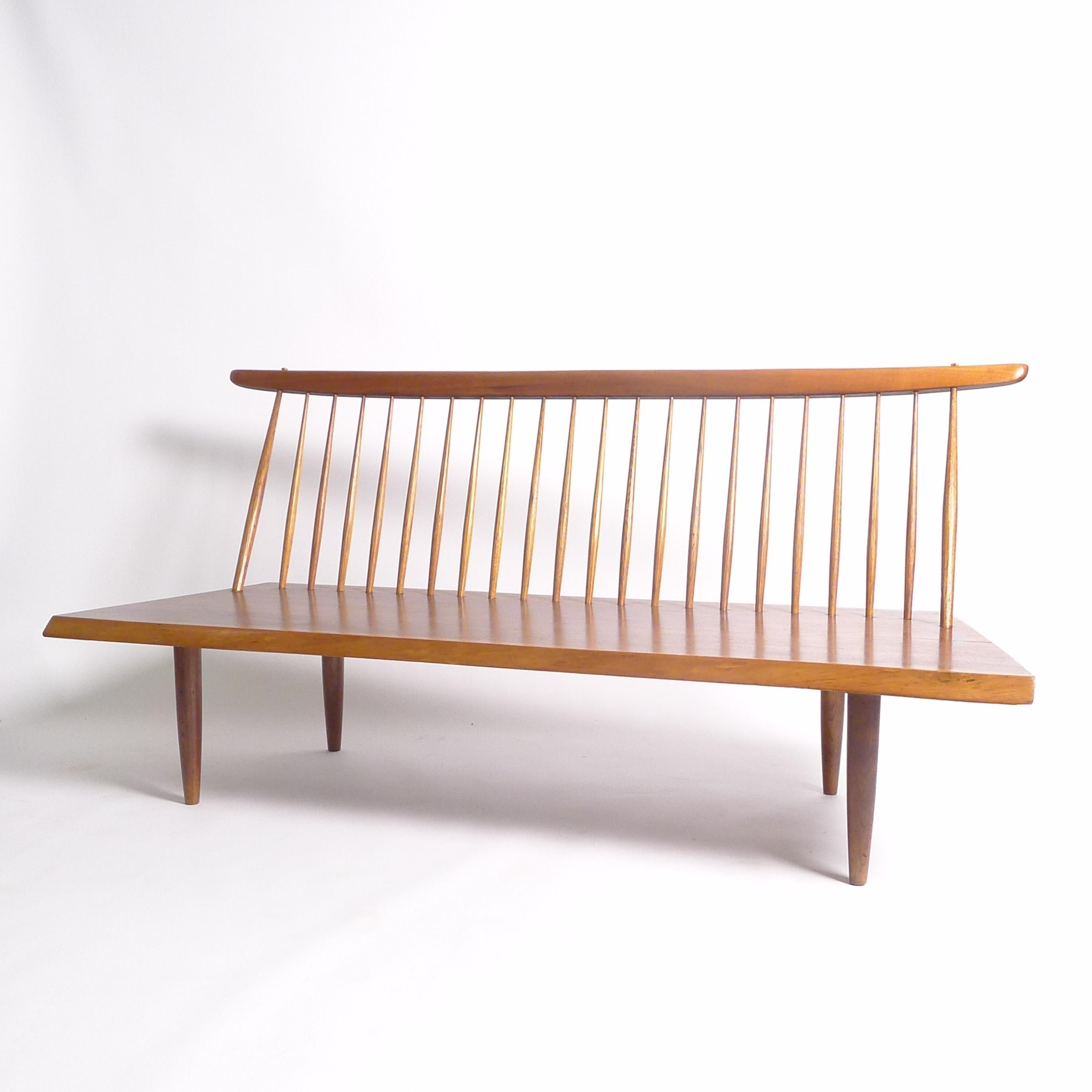 George Nakashima
Bench with Spindle Back
Nakashima Studio, USA 1958
American black walnut, hickory, rosewood
78.5cm high, 158cm wide, 65cm deep
single slab seat with one rosewood butterfly
inscribed with client's name to underside
sold with digital