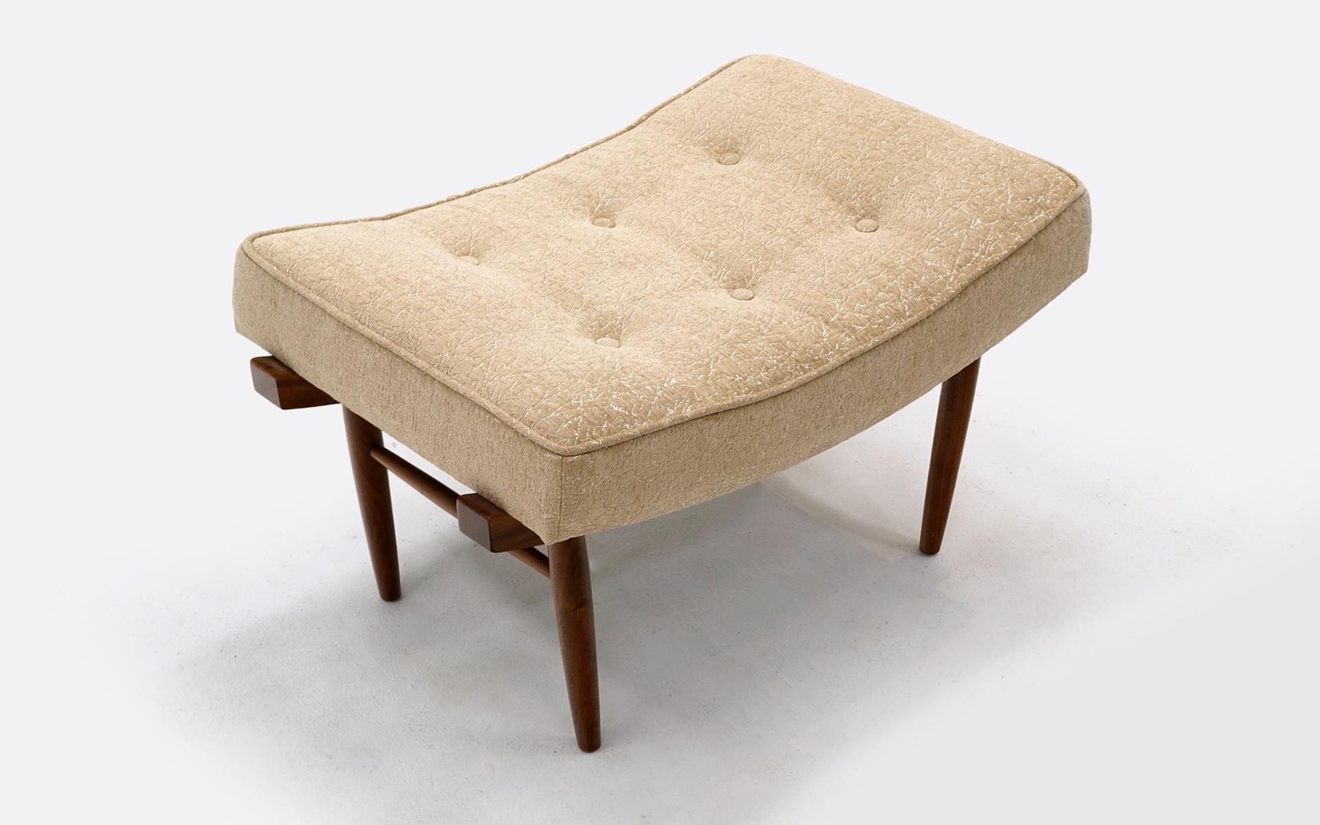 Low stool, ottoman, or vanity stool designed by George Nakashima for Widdicomb. Walnut base with original upholstery. No stains or tears. Shocking good original condition.