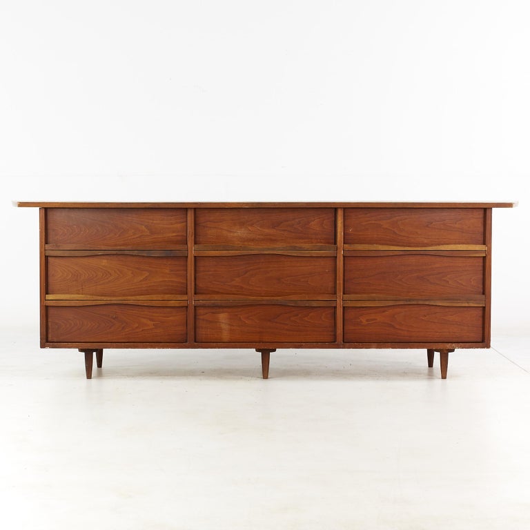 George Nakashima for Widdicomb mid century walnut 9 drawer lowboy dresser

This lowboy dresser measures: 98 wide x 22.5 deep x 32 inches high

All pieces of furniture can be had in what we call restored vintage condition. That means the piece is