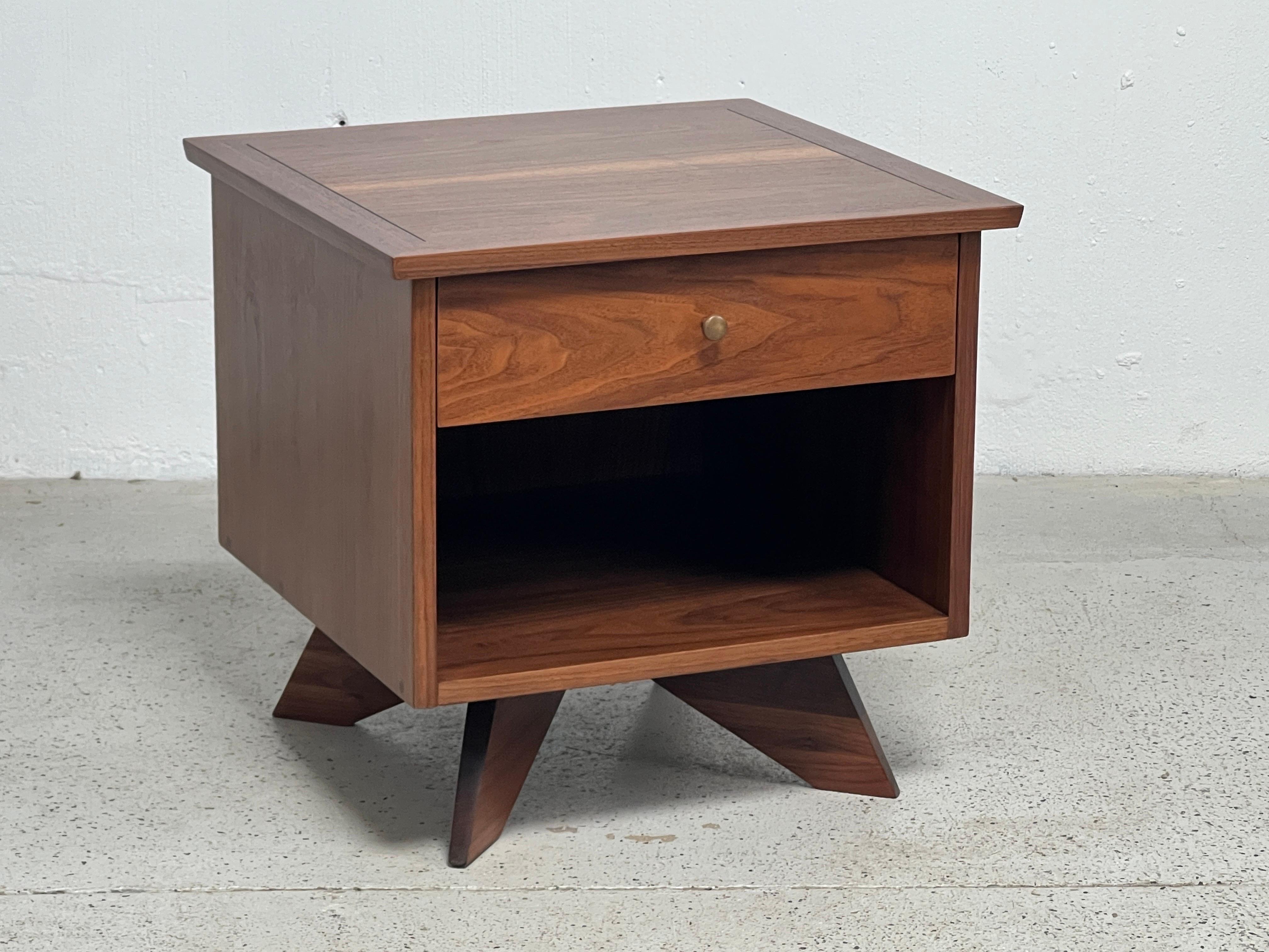 A walnut nightstand by George Nakashima for Widdicomb. 