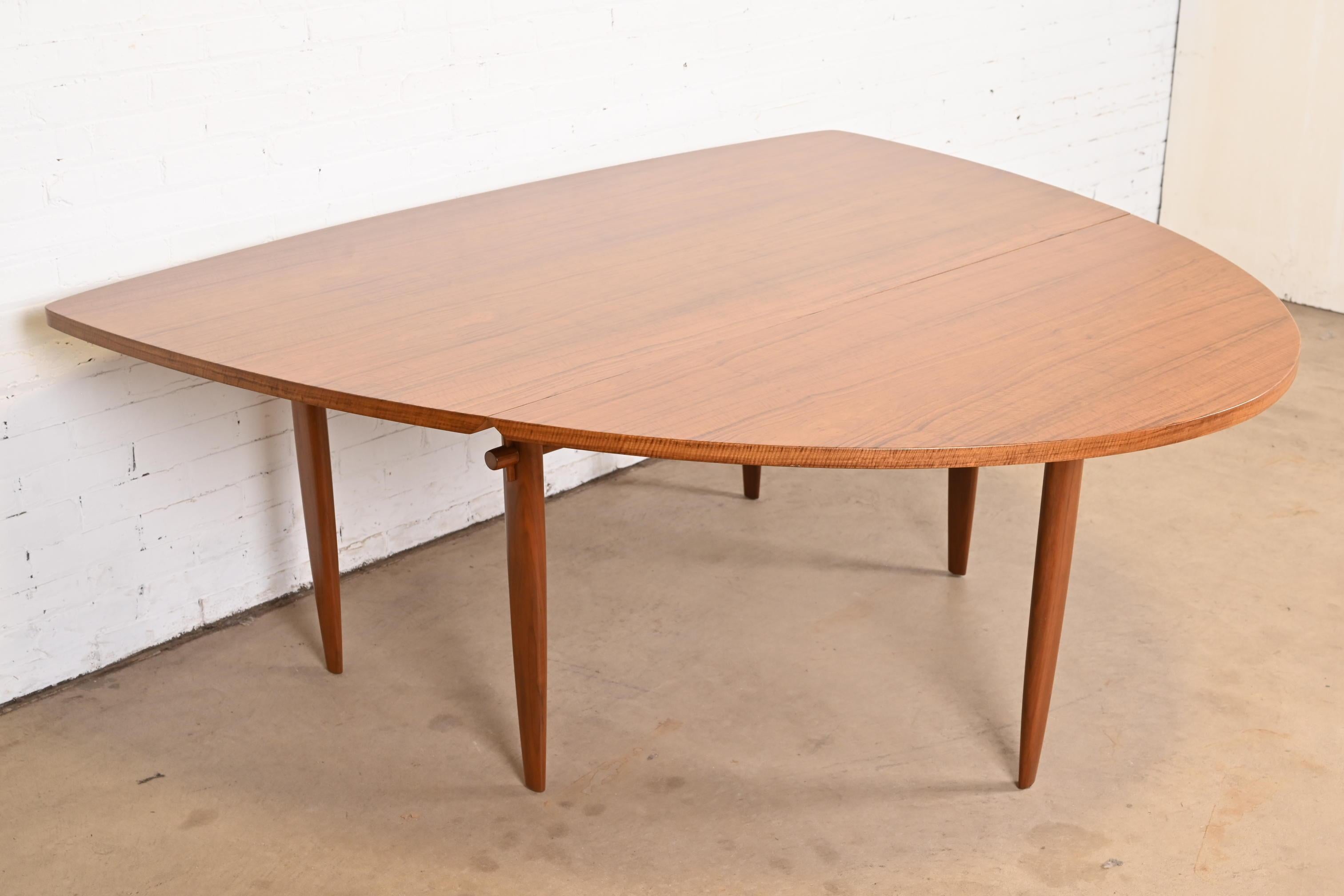 A very rare and exceptional mid-century Organic Modern drop-leaf dining table

By George Nakashima for Widdicomb Furniture, 